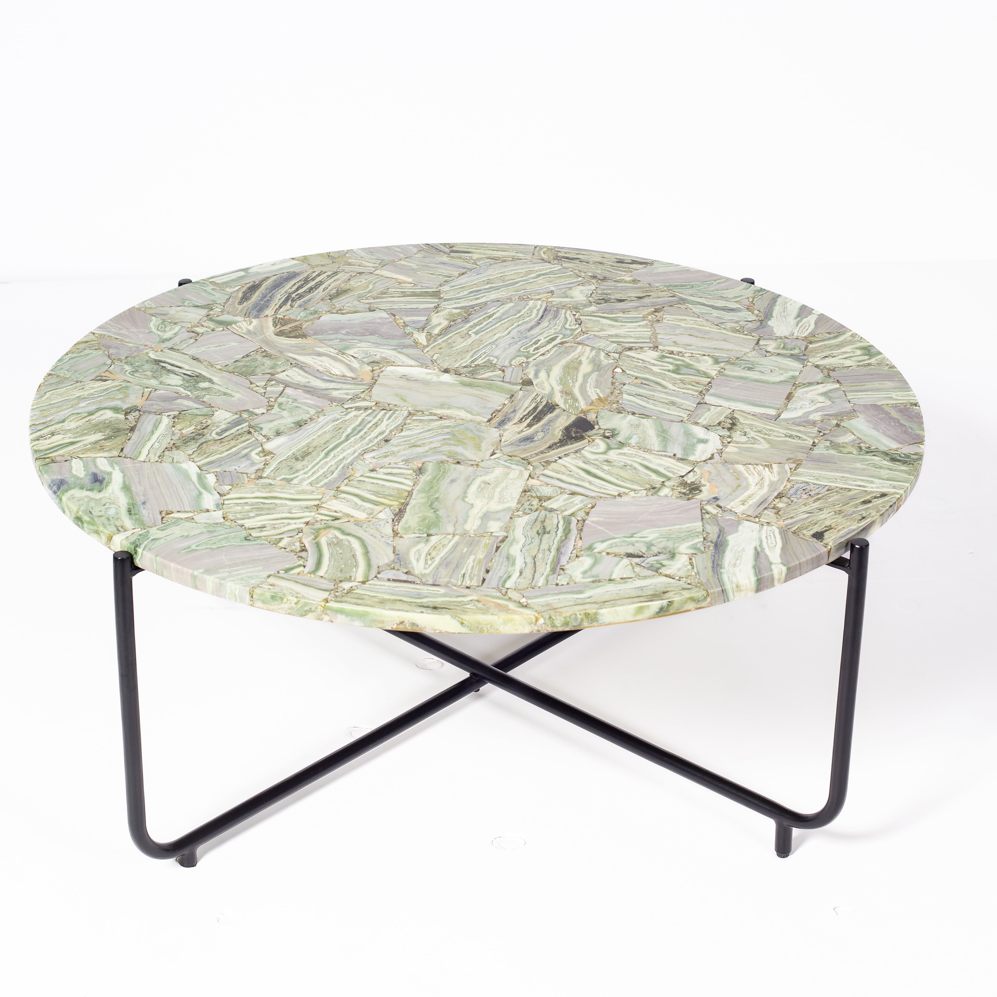 Handcrafted agate coffee table with round stone top and black metal base, artisan-made heritage piece.