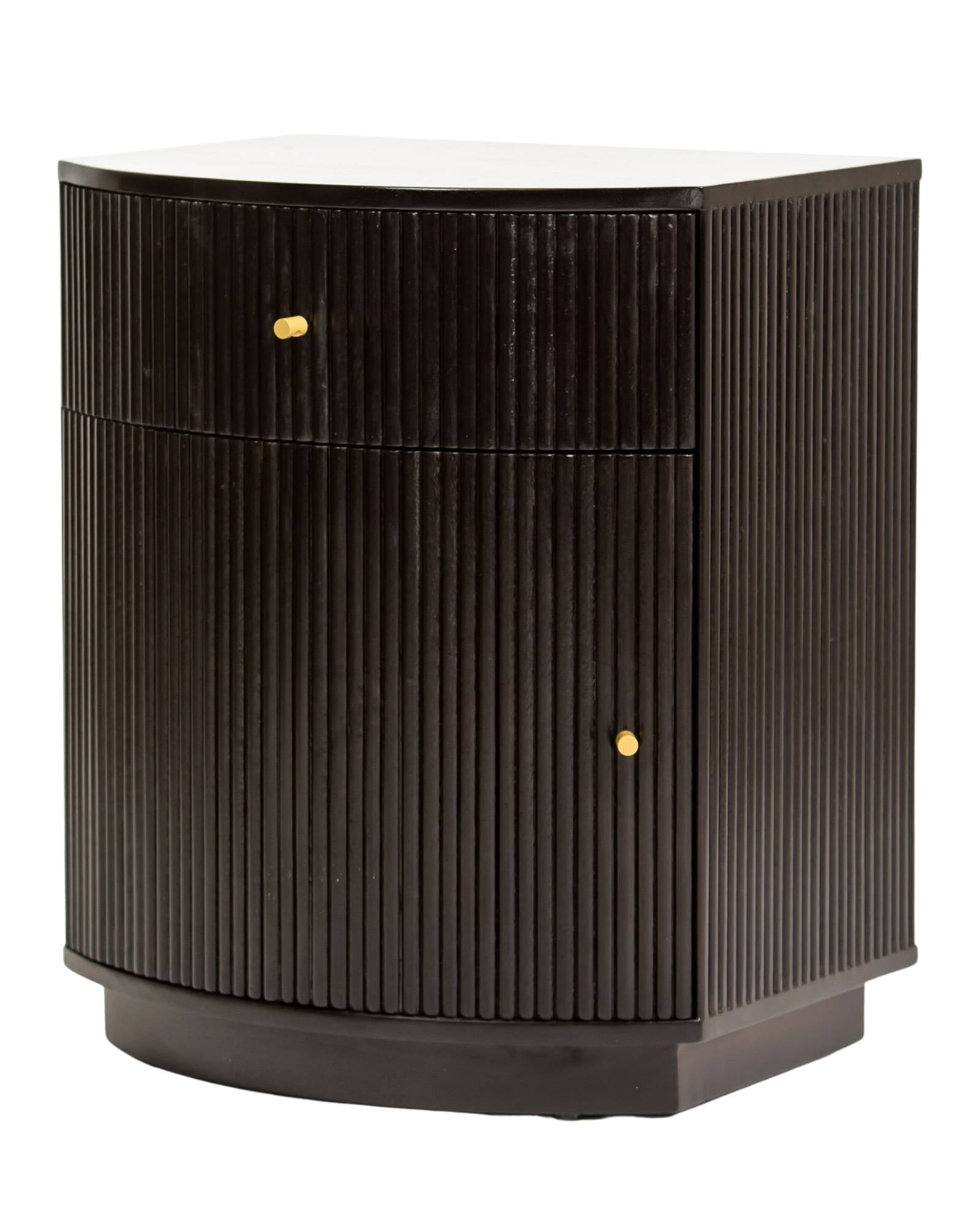 Wooden side drawer featuring fluted texture in black with brass accents, handcrafted furniture piece.