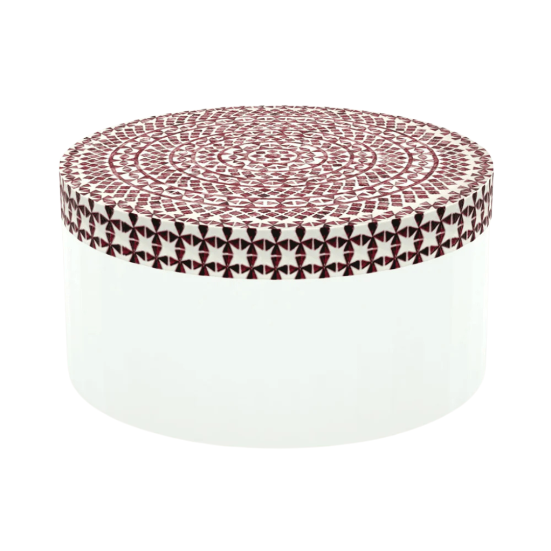 Round red bone inlay coffee table featuring a vibrant mosaic pattern on the top and sides. Perfect for modern and eclectic interiors.