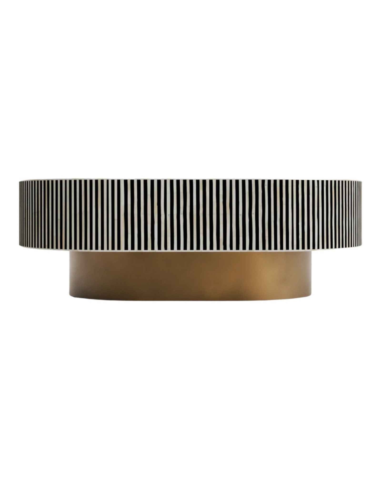 Black and white bone inlay coffee table with geometric pattern and gold base in contemporary setting.