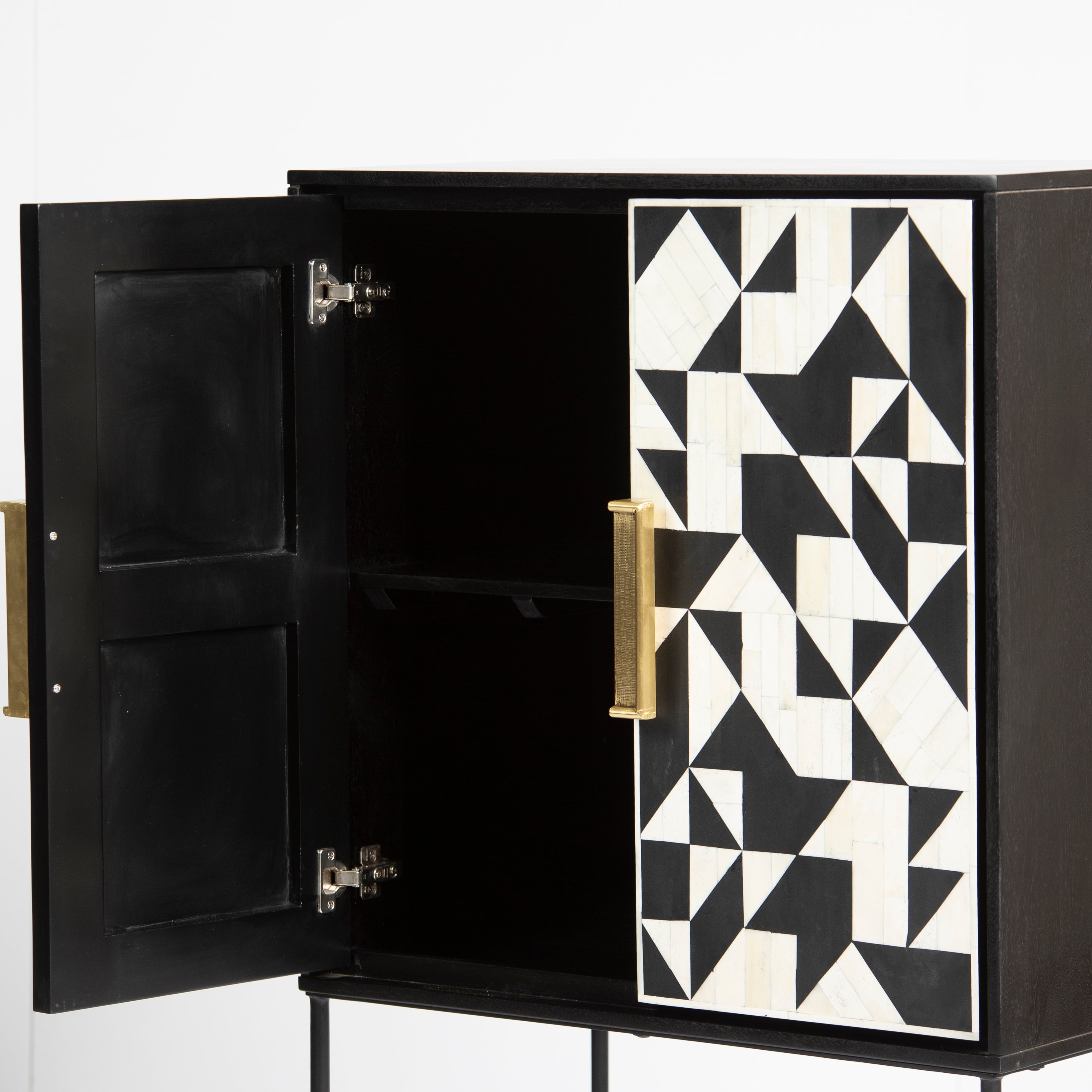 Bone inlay cabinet featuring geometric pattern in black and white with metal base, handcrafted furniture piece