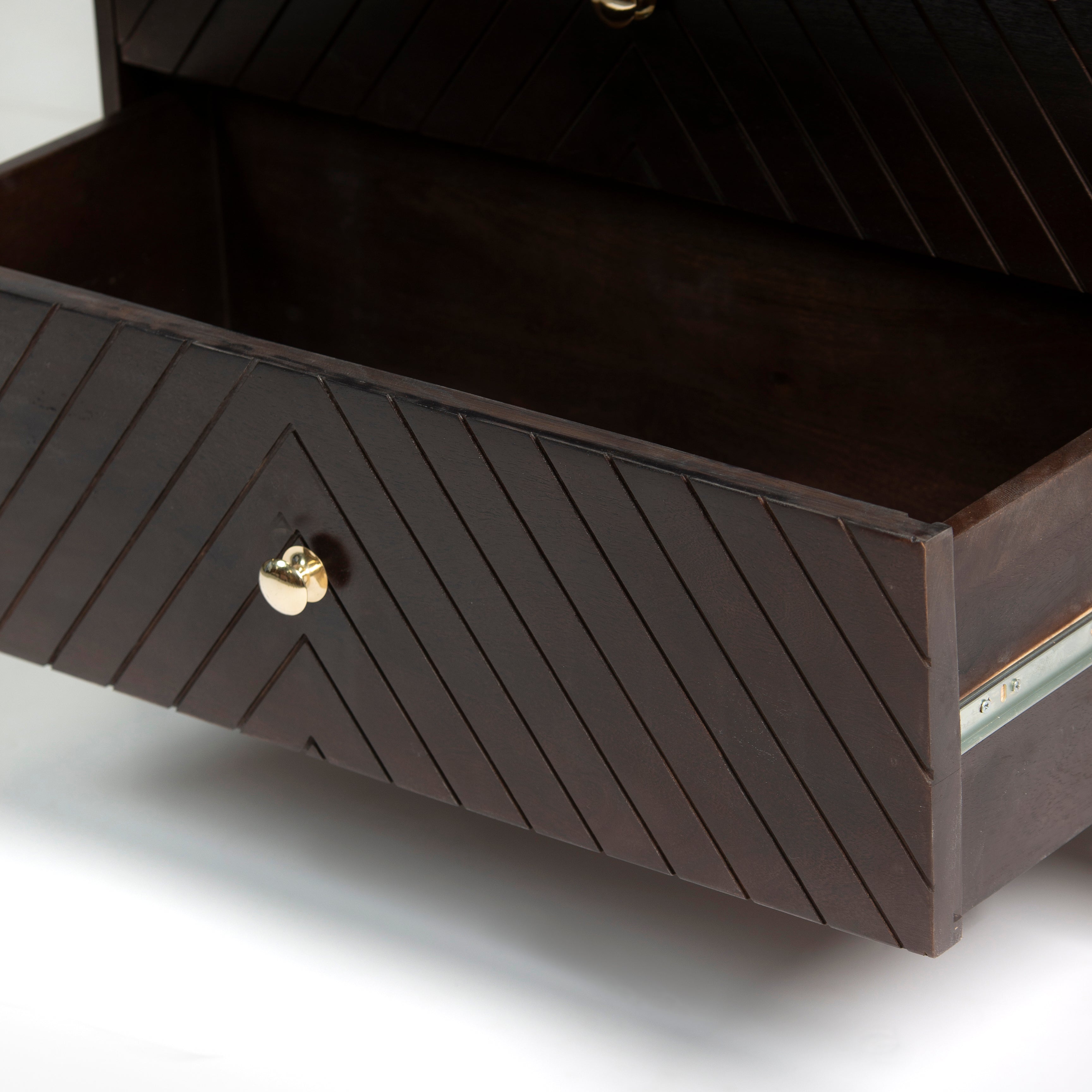 Wooden chest of drawers featuring chevron pattern in brown with brass accents, handcrafted furniture piece