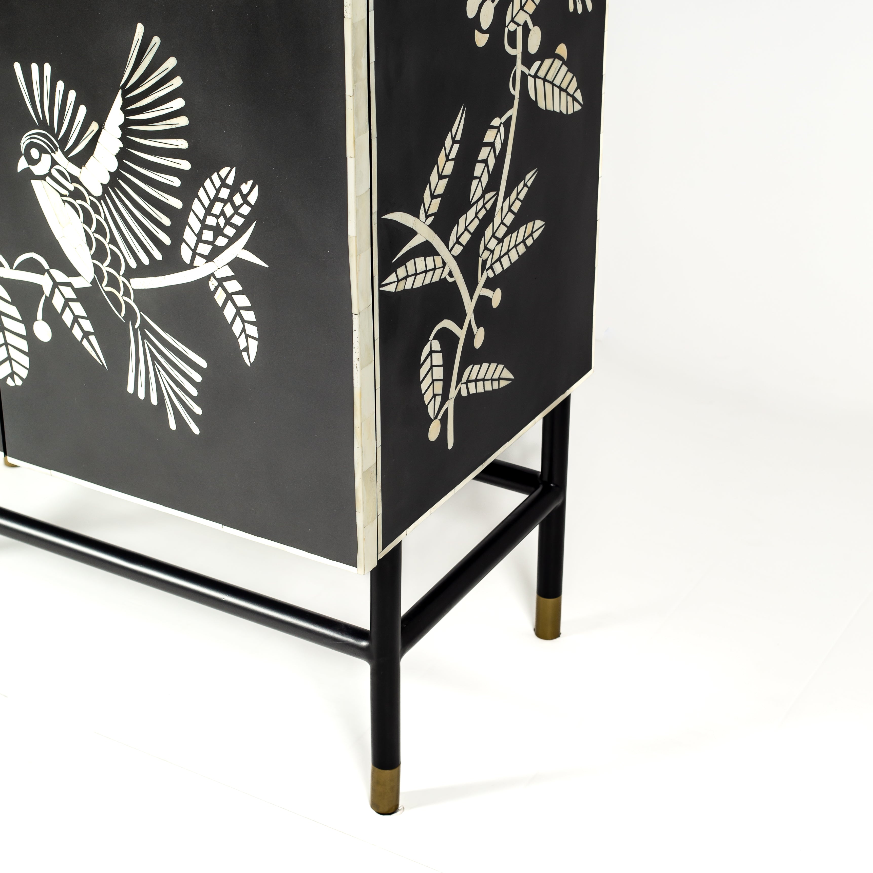 Handcrafted white bone inlay cabinet by Tabeer Homes, featuring bird and leaf motifs on mango wood with brass handles and global delivery.