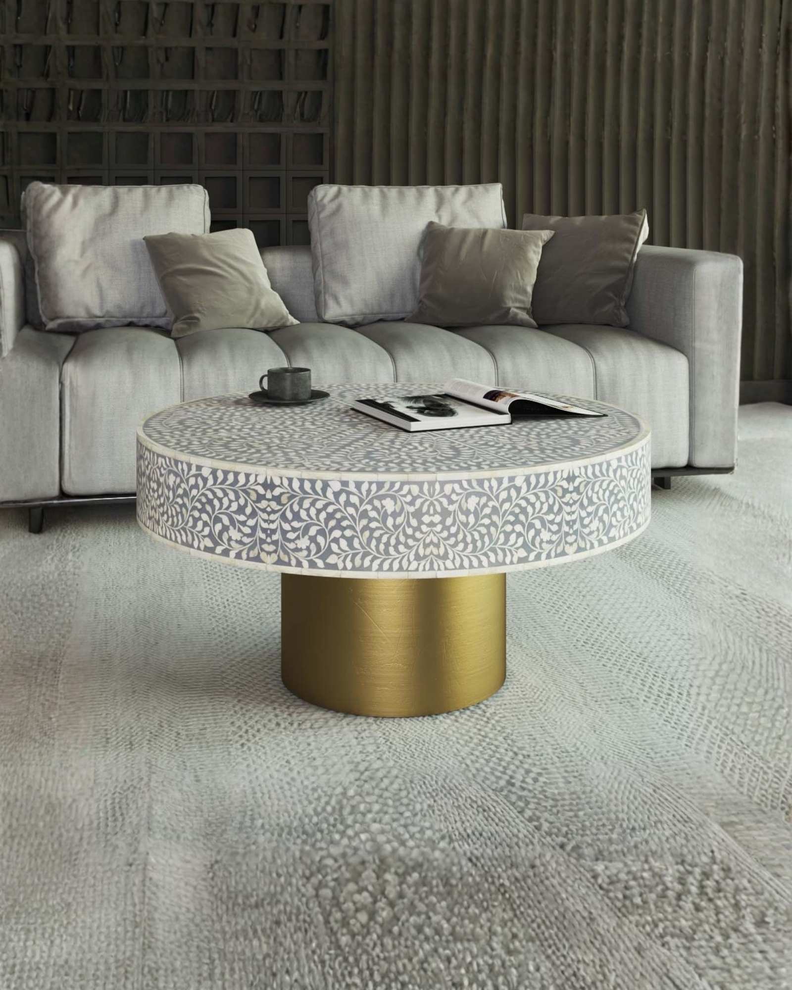 Round grey bone inlay coffee table featuring an intricate floral pattern