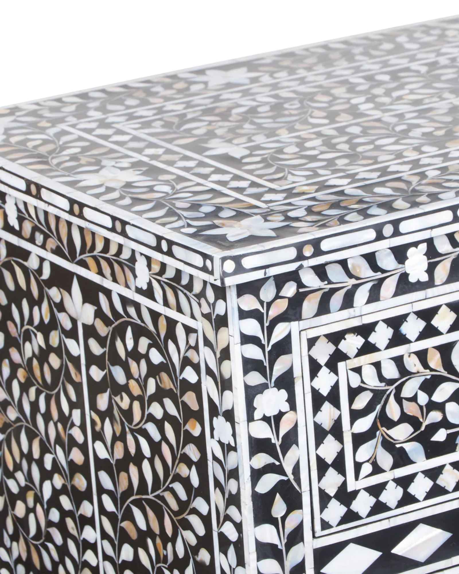 Elegant Iris Chest of Drawers in black Mother of Pearl inlay, featuring intricate floral patterns and spacious storage.
