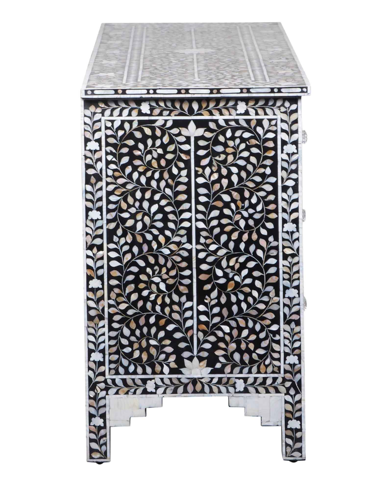 Elegant Iris Chest of Drawers in black Mother of Pearl inlay, featuring intricate floral patterns and spacious storage.
