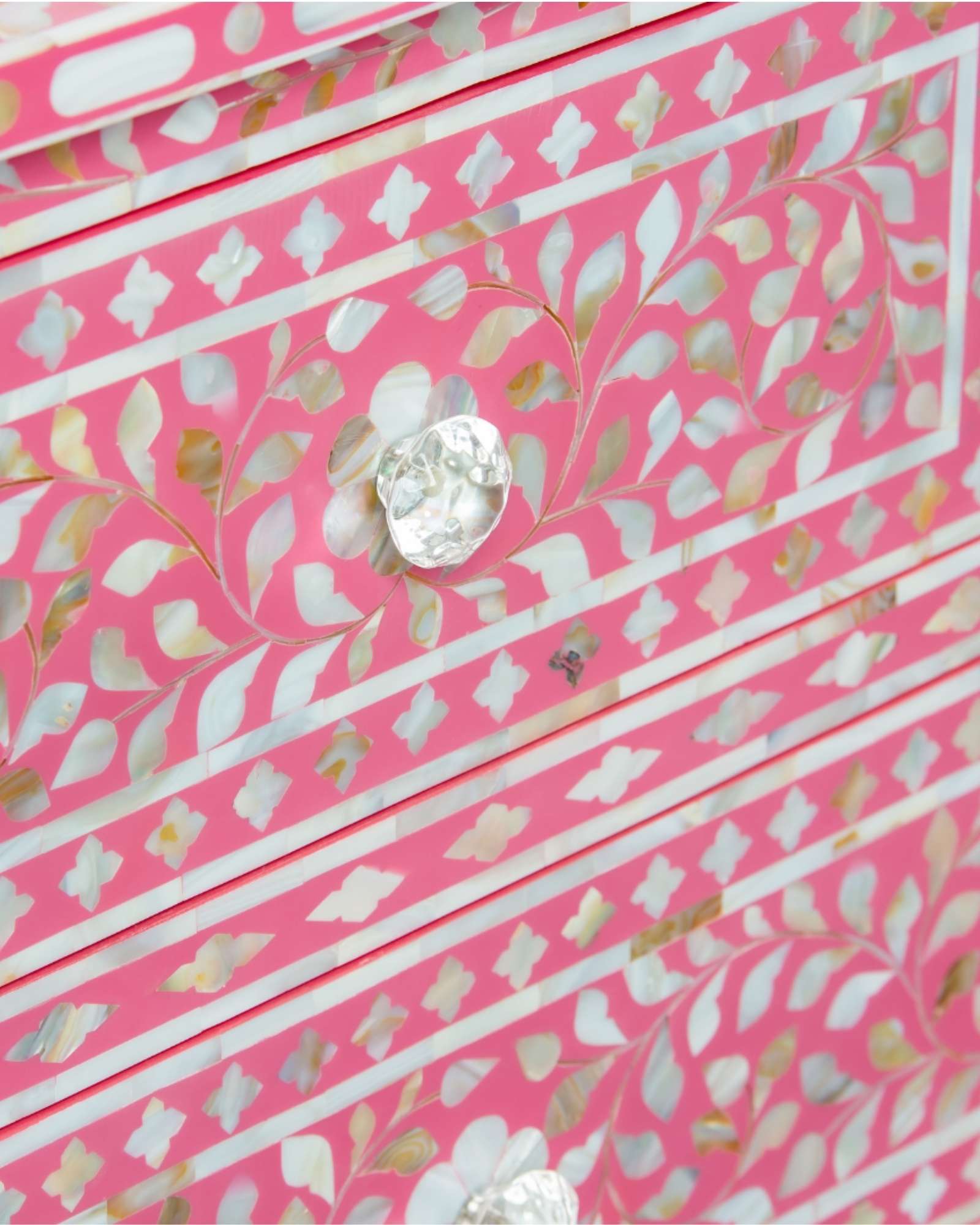 Beautifully handcrafted, pink mother of pearl chest of drawers featuring 4 drawers and crystal knobs for a soft & mesmerising interior space by Tabeer Homes.