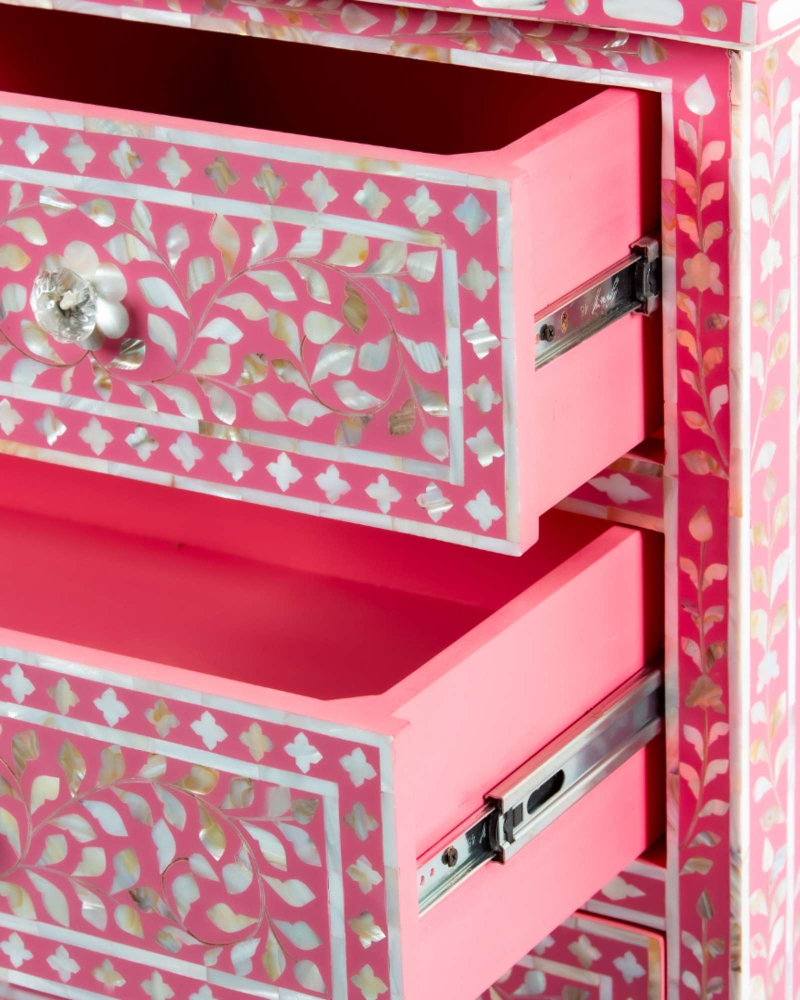 Beautifully handcrafted, pink mother of pearl chest of drawers featuring 4 drawers and crystal knobs for a soft & mesmerising interior space by Tabeer Homes.
