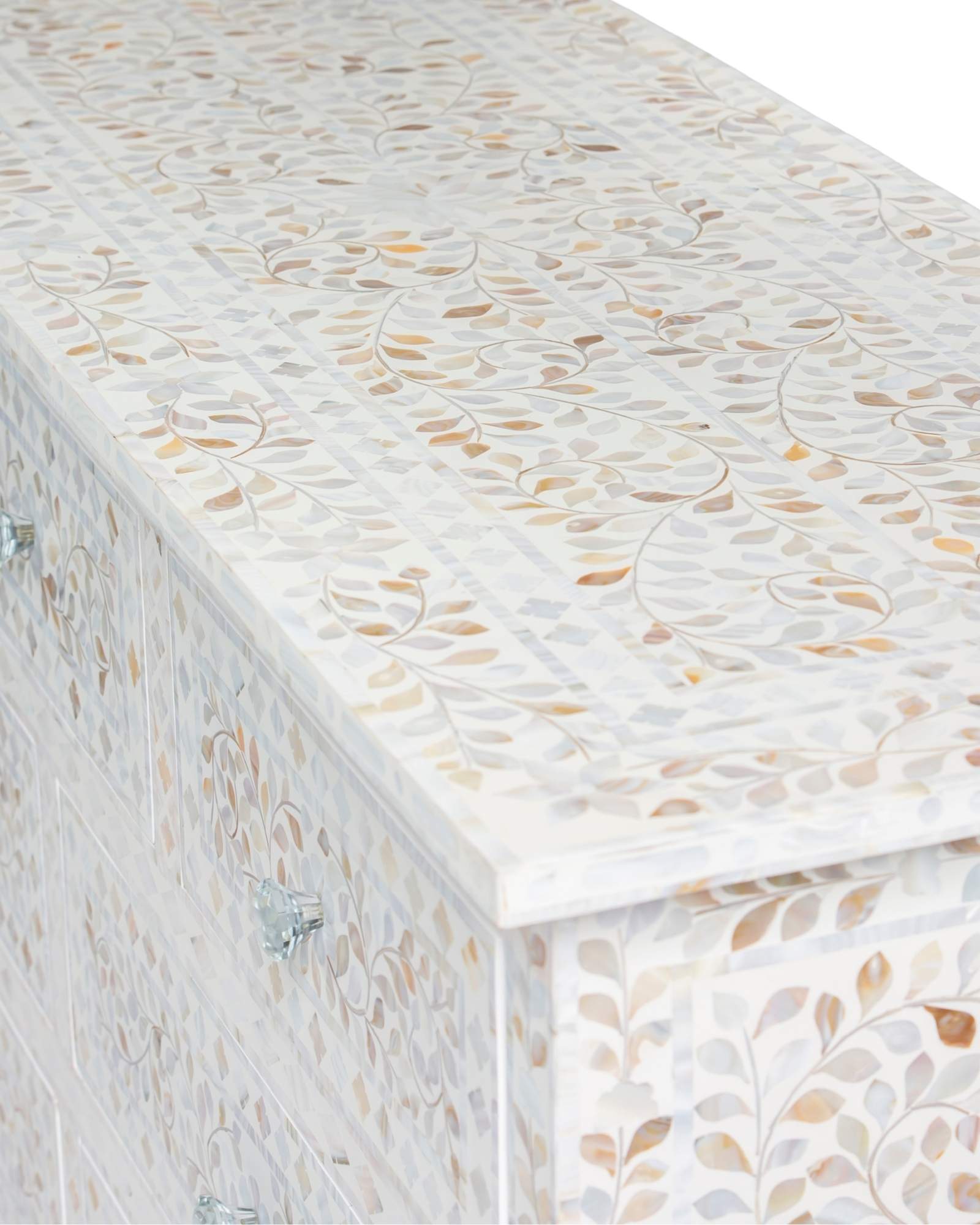 Mother of pearl inlay chest of drawers featuring intricate floral pattern in white and multitone, handcrafted furniture piece.
