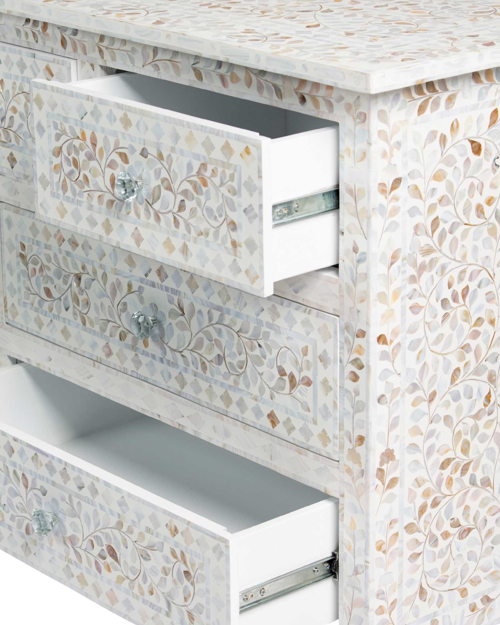 Mother of pearl inlay chest of drawers featuring intricate floral pattern in white and multitone, handcrafted furniture piece.