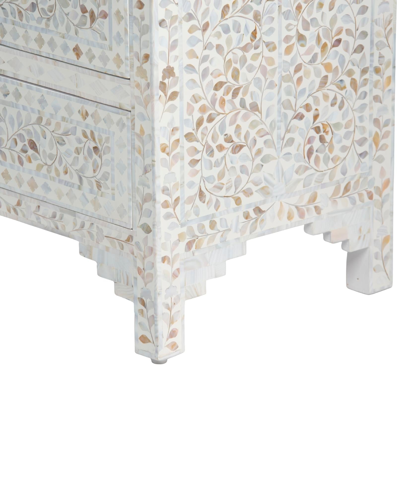 Mother of pearl inlay chest of drawers featuring intricate floral pattern in white and multitone, handcrafted furniture piece.