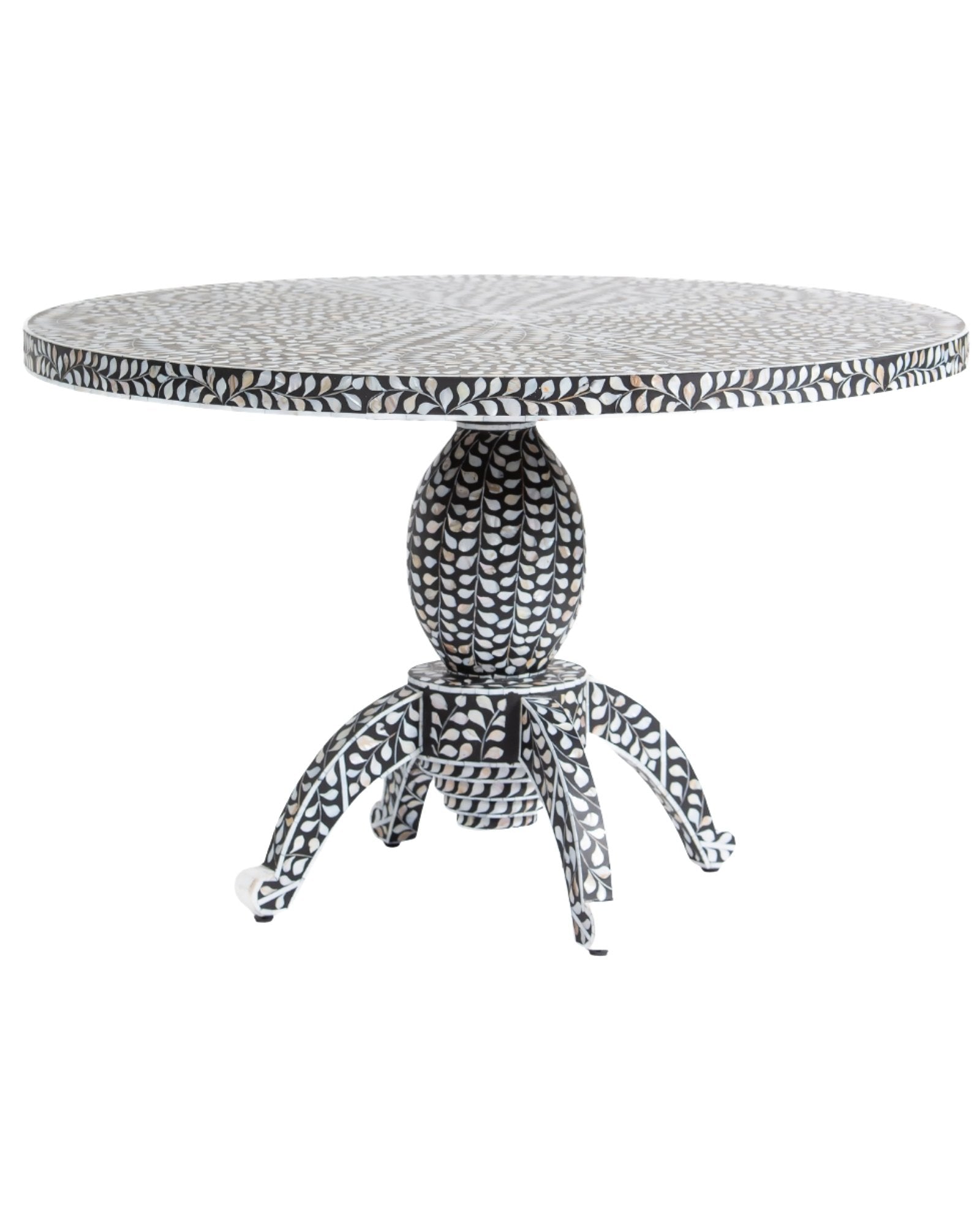 Handcrafted Iris dining table featuring black mother of pearl inlay with a round top and sculptural pedestal base.