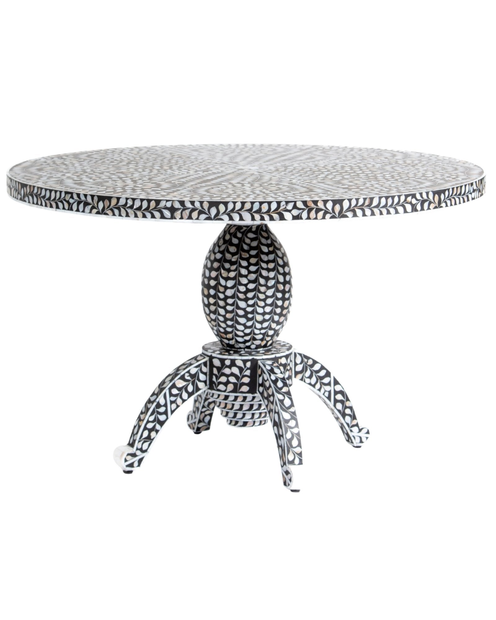 Handcrafted Iris dining table featuring black mother of pearl inlay with a round top and sculptural pedestal base.