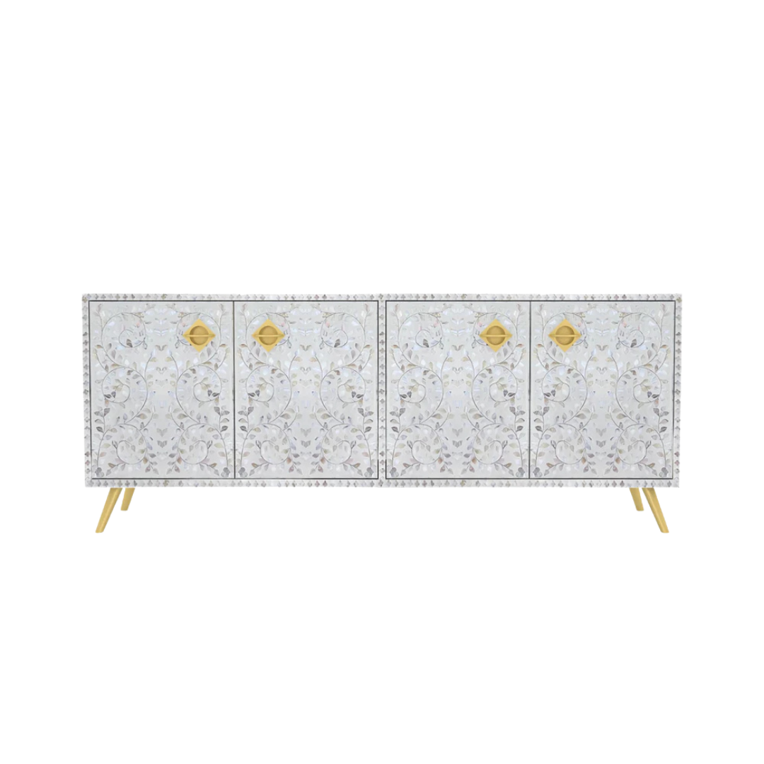 Handcrafted white TV Unit with intricate Mother of Pearl inlay, featuring a floral pattern and sleek metal legs. A luxurious storage solution for any space. 