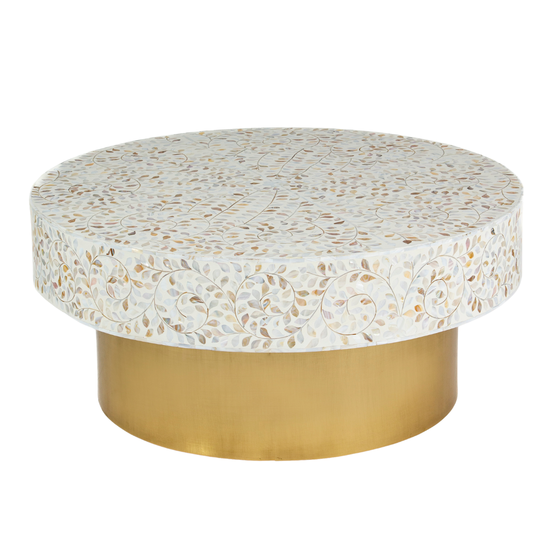 White mother of pearl inlay coffee table featuring intricate floral vine design and brushed gold cylindrical base by Tabeer Homes.