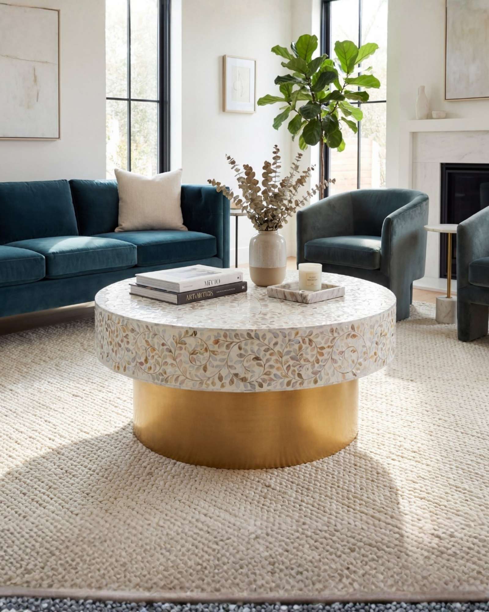 White mother of pearl inlay coffee table featuring intricate floral vine design and brushed gold cylindrical base by Tabeer Homes.
