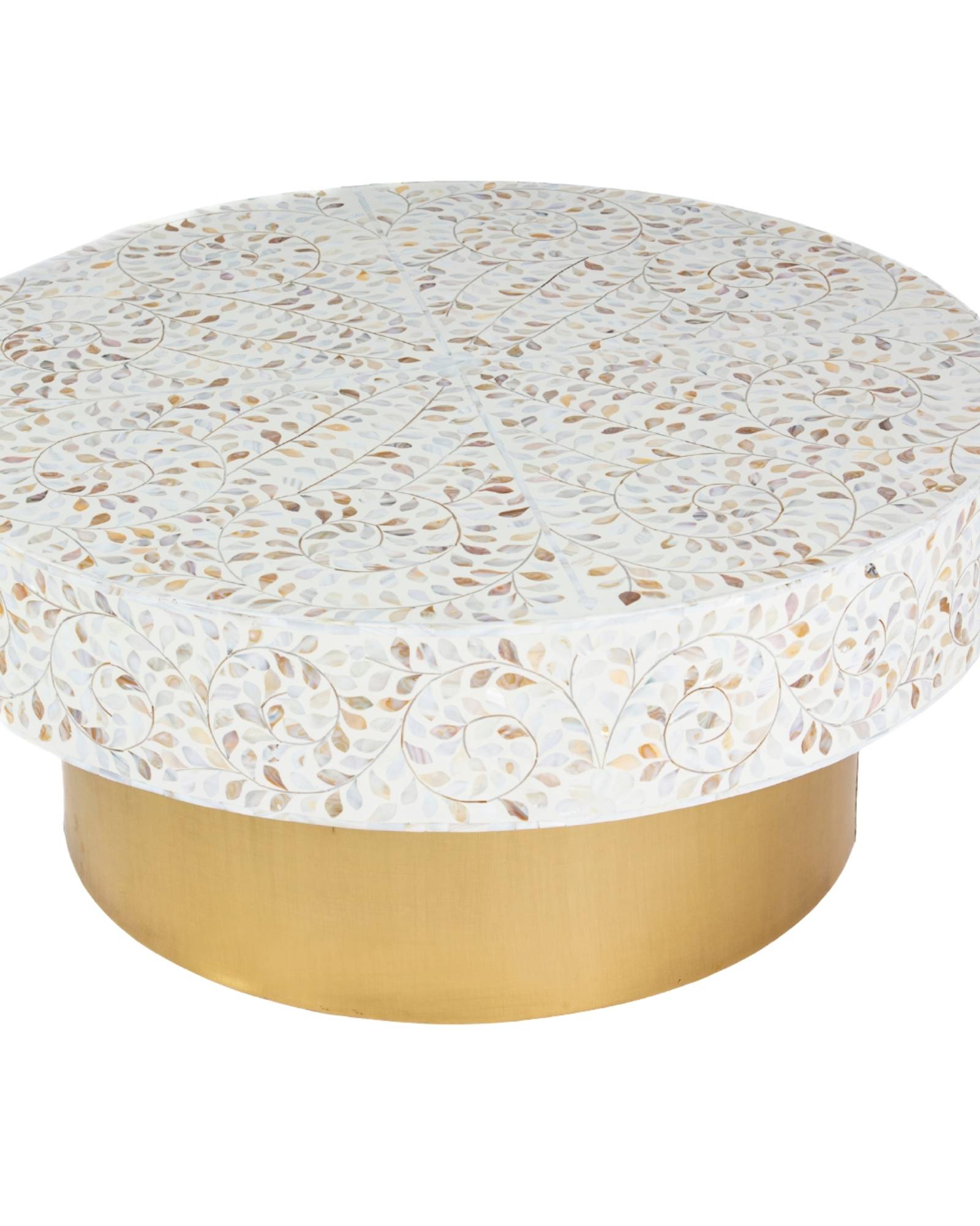 White mother of pearl inlay coffee table featuring intricate floral vine design and brushed gold cylindrical base by Tabeer Homes.