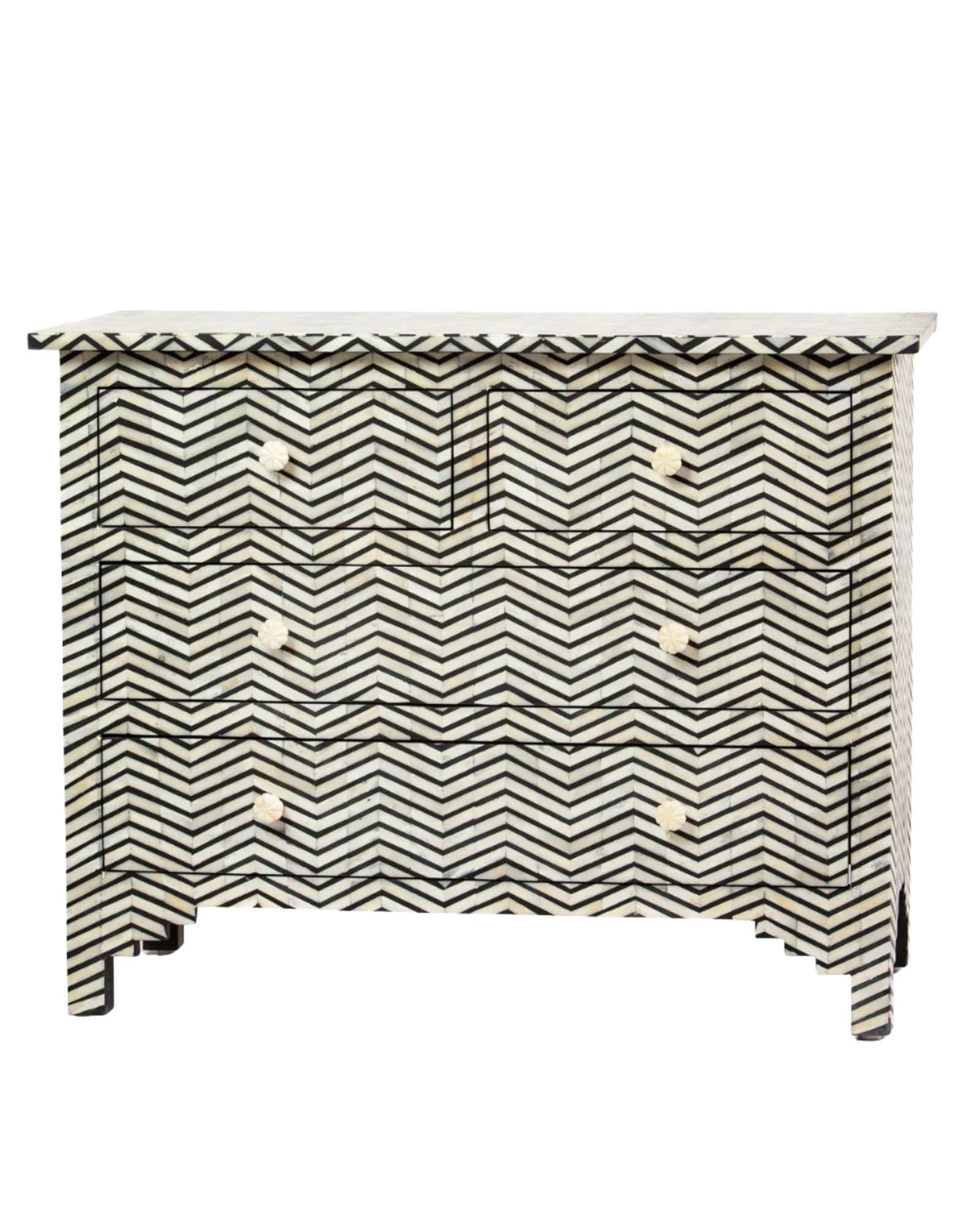 Featuring a Black Bone Inlay Chest of Drawer in chevron pattern, the Isra collection enhances your space with intricately handcrafted designs that elevate your home and living aesthetics. 