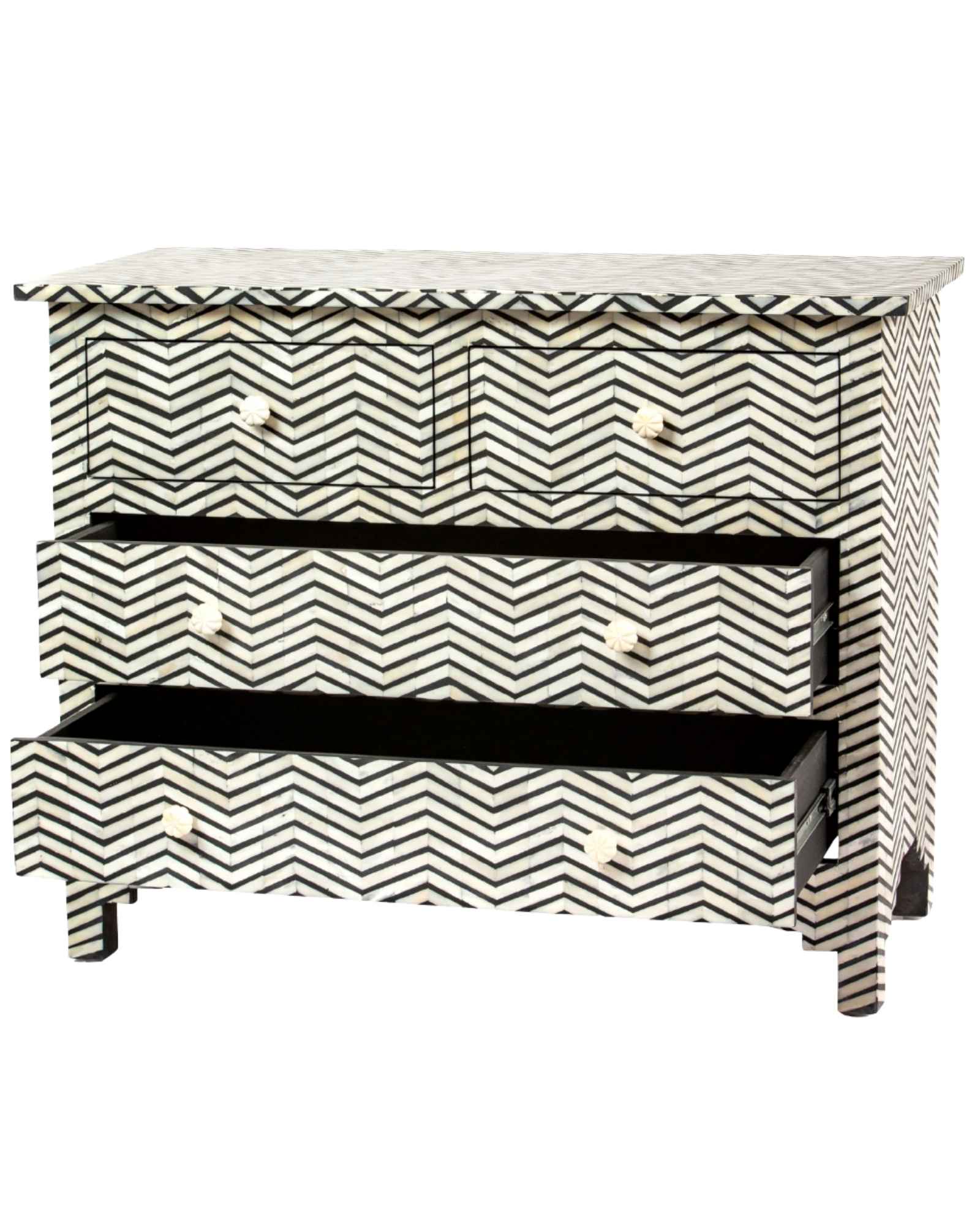 Featuring a Black Bone Inlay Chest of Drawer in chevron pattern, the Isra collection enhances your space with intricately handcrafted designs that elevate your home and living aesthetics. 
