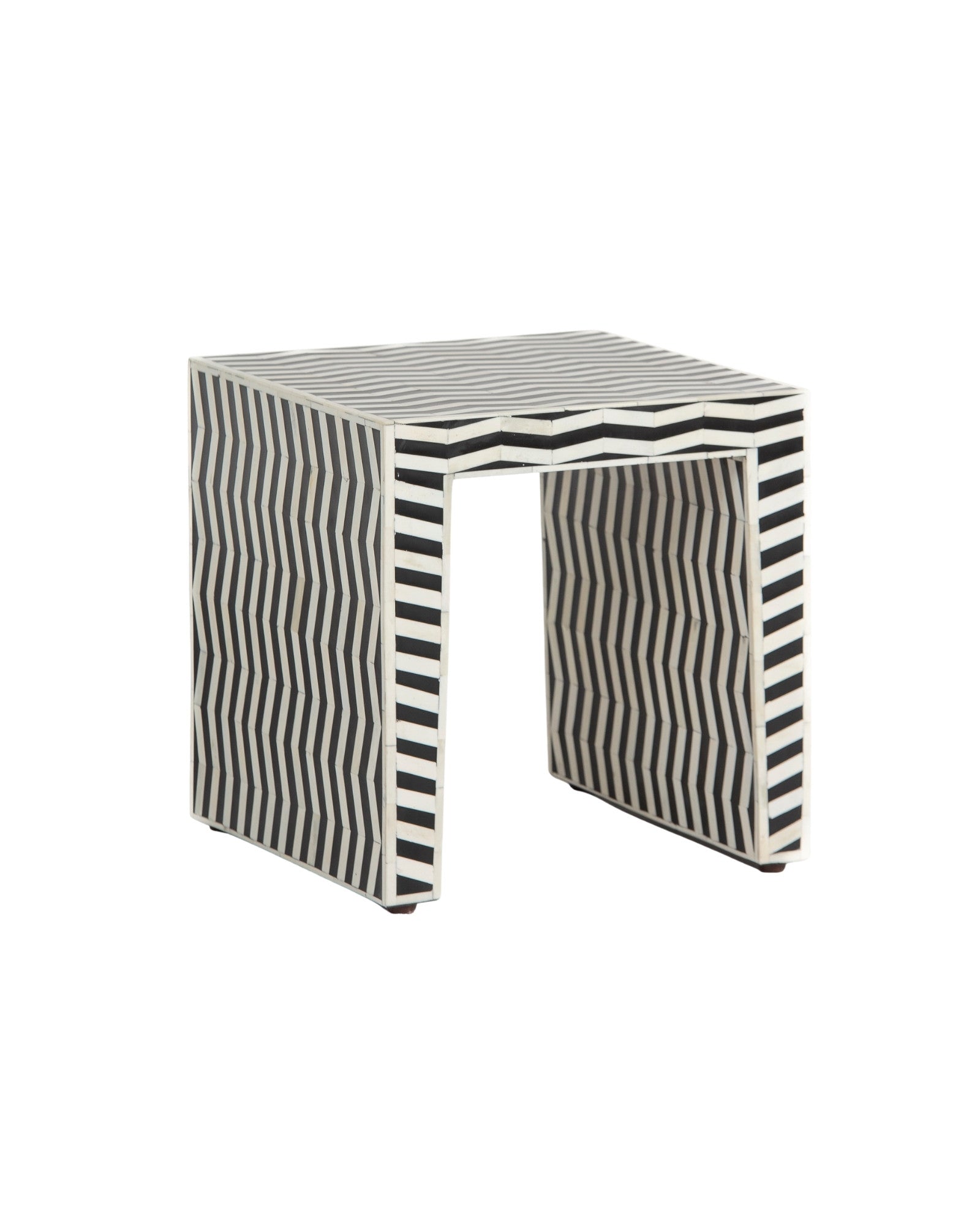 Handcrafted Isra side table featuring black bone inlay with geometric striped detailing and a compact cubic form.