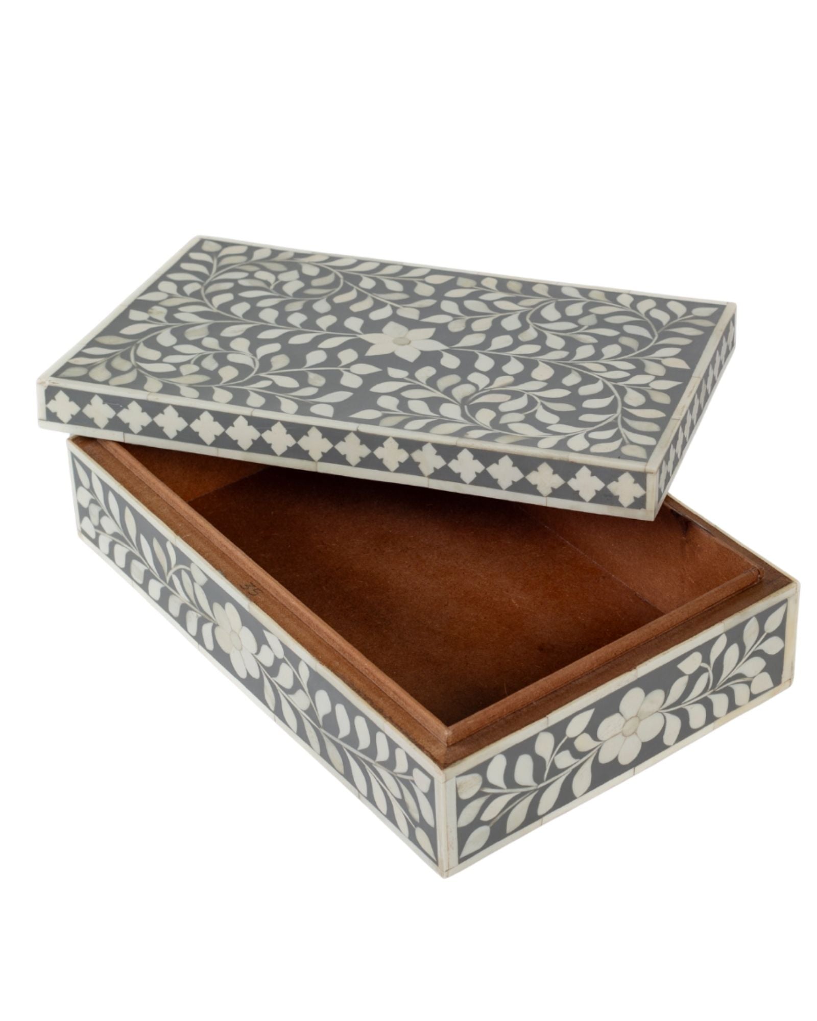 A soft grey decorative box crafted in bone inlay, combining subtle tones with intricate floral detailing.