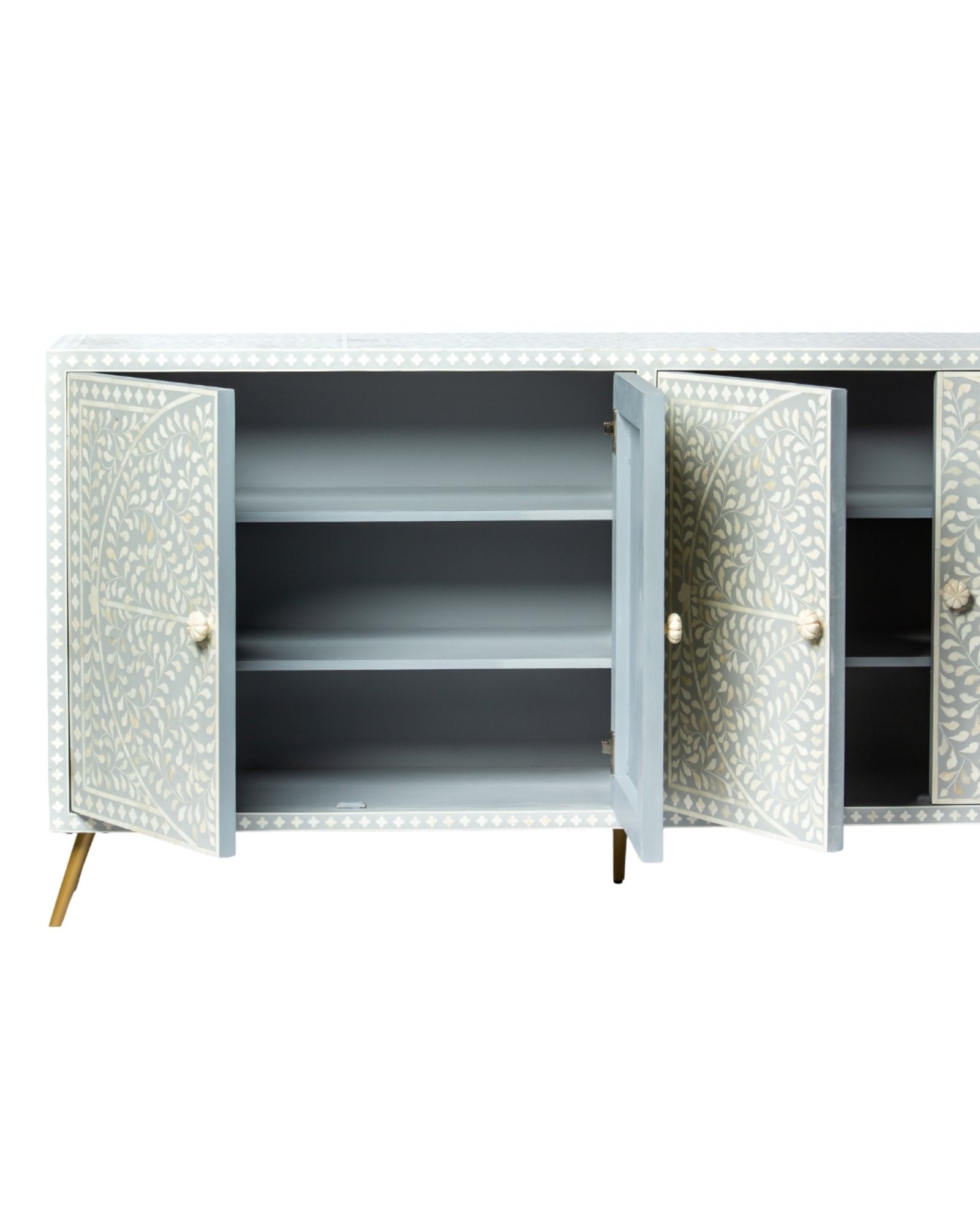 Grey bone inlay cabinet with floral vine pattern, brass legs, and carved bone knobs, handcrafted with spacious storage and artisanal charm.
