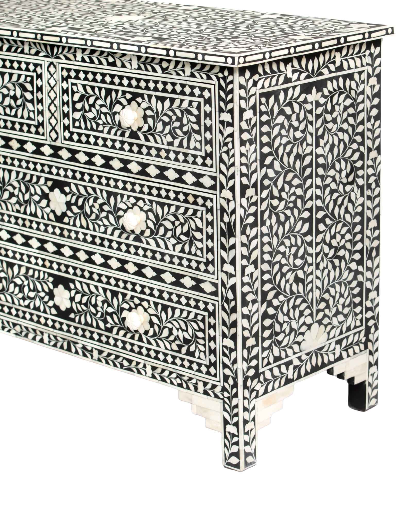 Bone inlay chest of drawers featuring intricate floral pattern in black and white, handcrafted furniture piece.