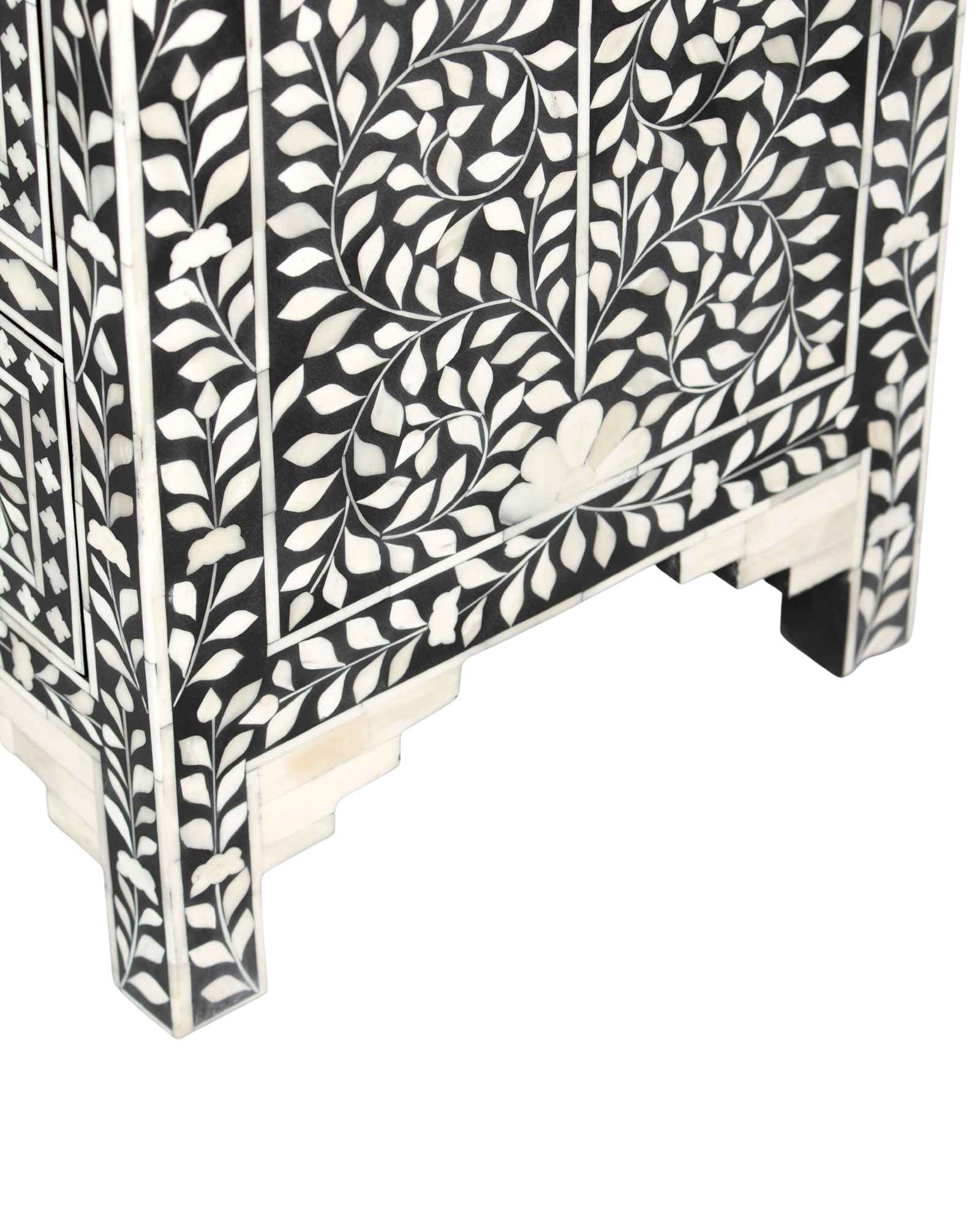 Bone inlay chest of drawers featuring intricate floral pattern in black and white, handcrafted furniture piece.
