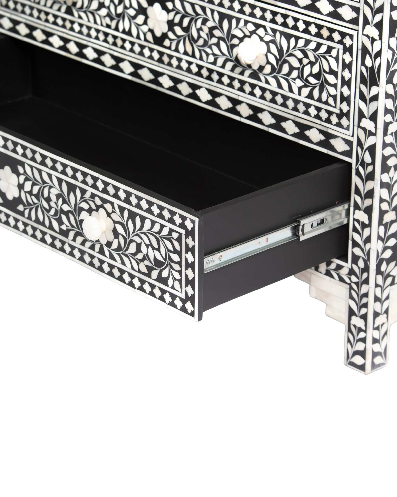 Bone inlay chest of drawers featuring intricate floral pattern in black and white, handcrafted furniture piece.