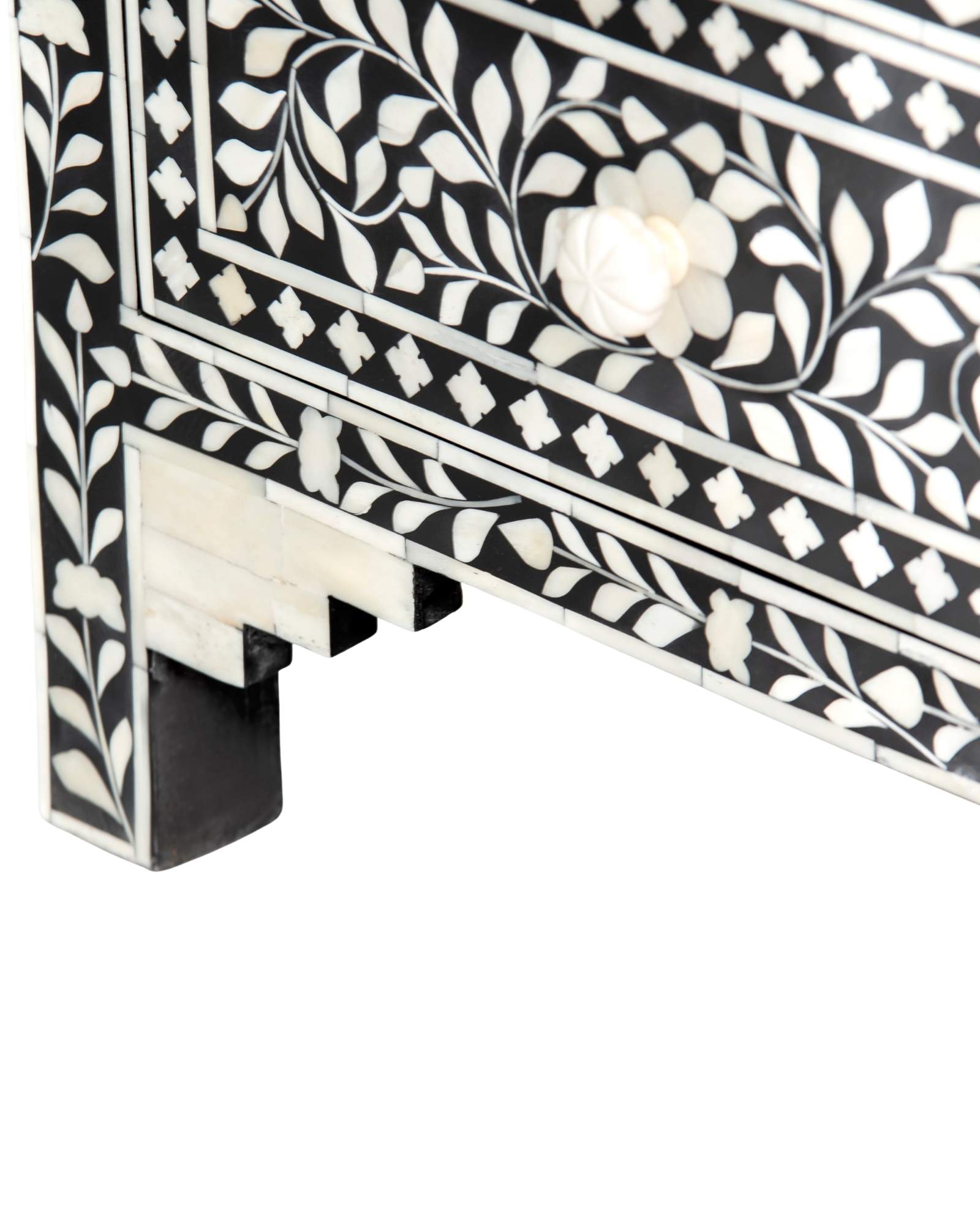 Bone inlay chest of drawers featuring intricate floral pattern in black and white, handcrafted furniture piece.