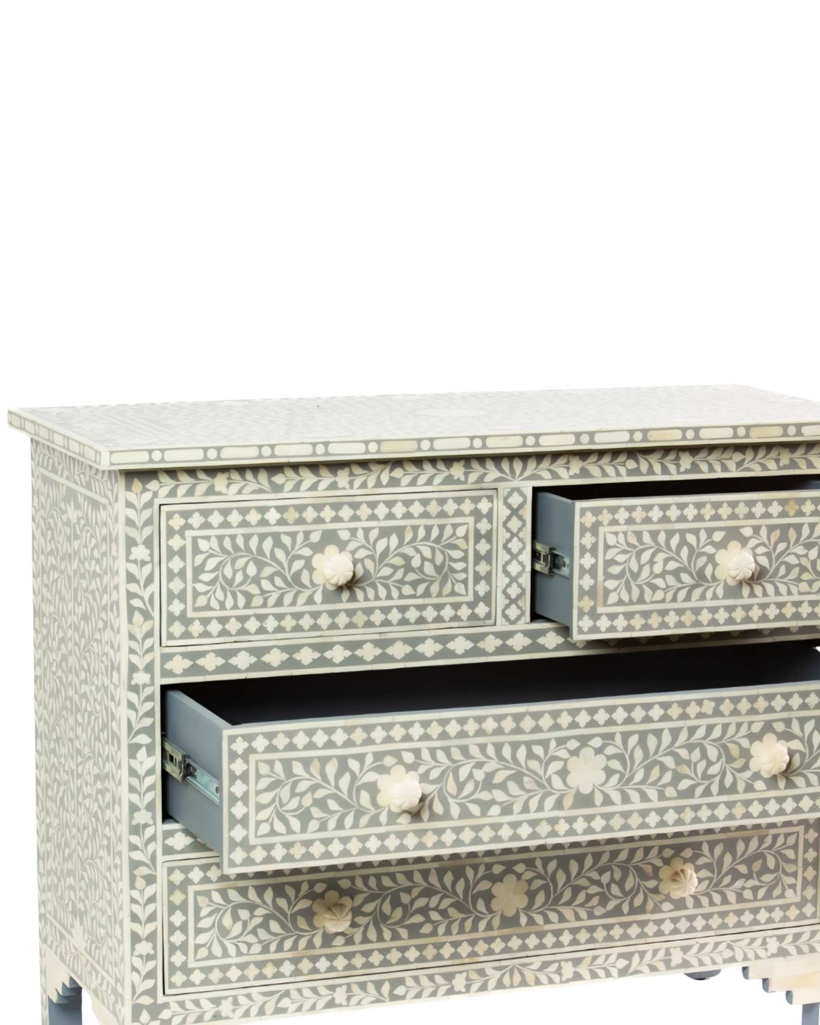 Featuring a Grey Bone Inlay Chest of Drawer in floral pattern, the Jade collection enhances your space with intricately handcrafted designs that elevate your home and living aesthetics. 