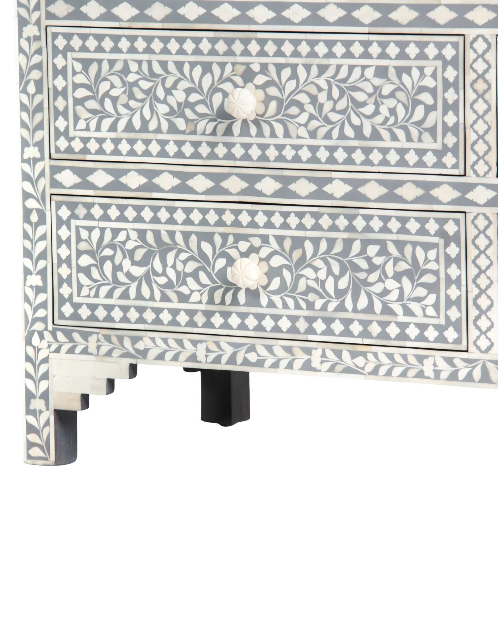 Bone inlay chest of drawers featuring intricate floral pattern in grey and white, handcrafted furniture piece.