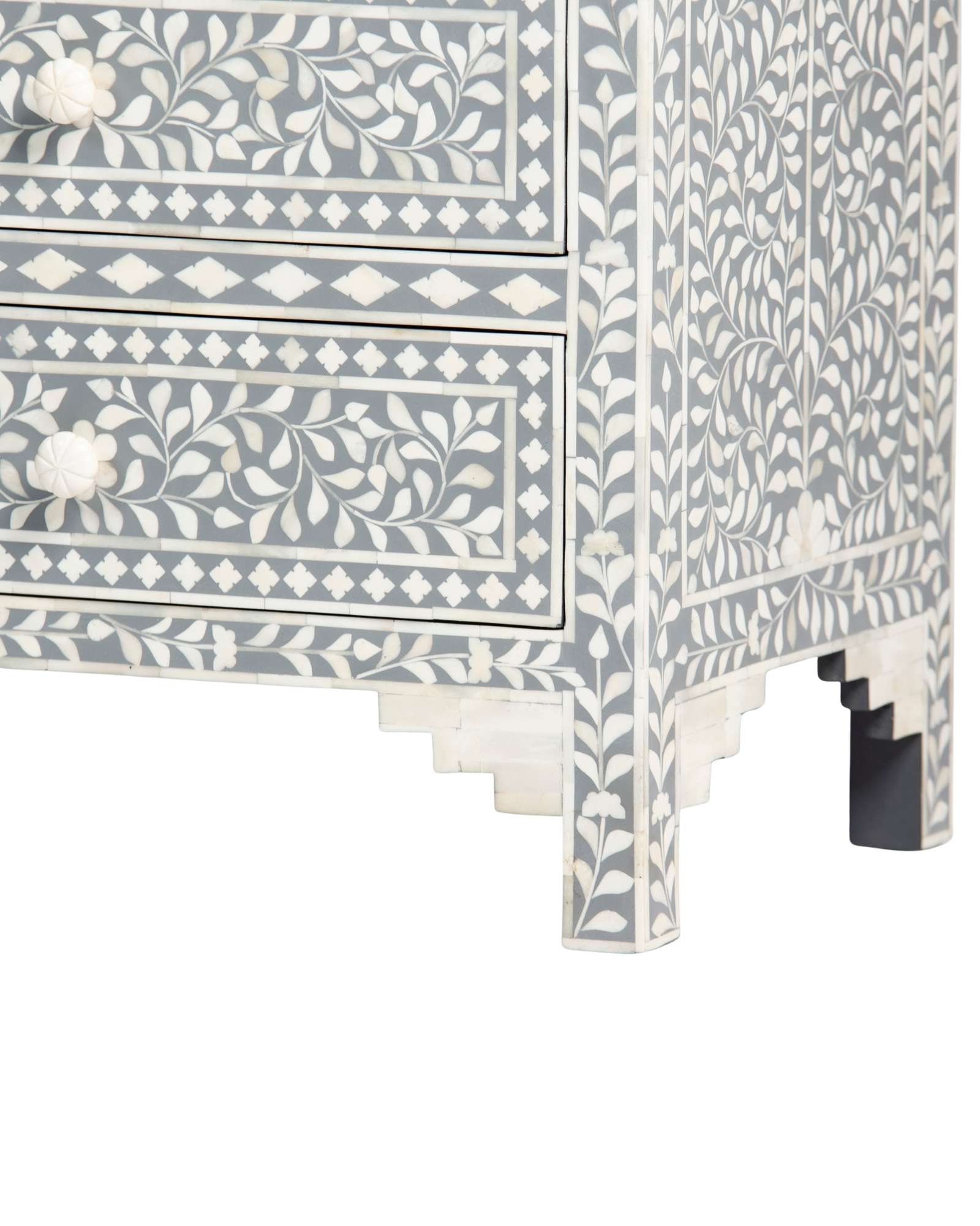 Bone inlay chest of drawers featuring intricate floral pattern in grey and white, handcrafted furniture piece.