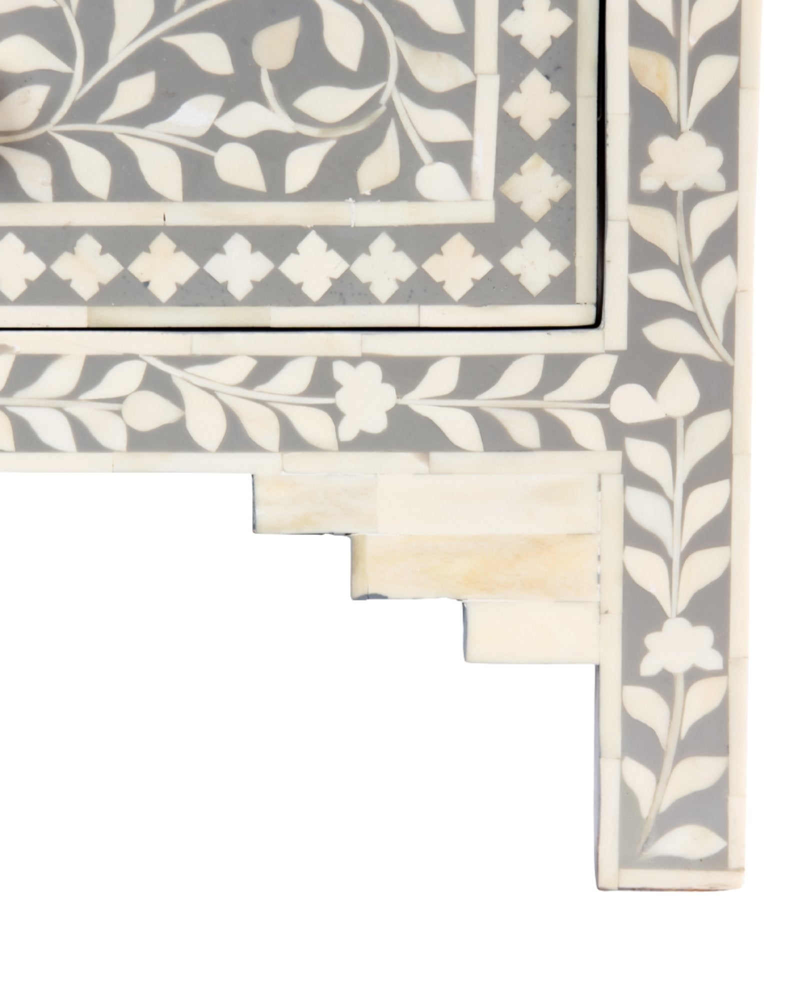 Featuring a Grey Bone Inlay Chest of Drawer in floral pattern, the Jade collection enhances your space with intricately handcrafted designs that elevate your home and living aesthetics. 