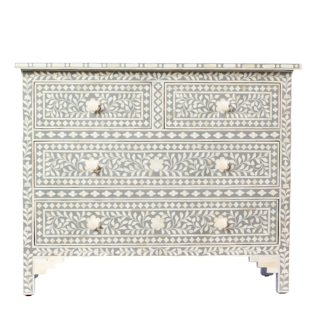 Featuring a Grey Bone Inlay Chest of Drawer in floral pattern, the Jade collection enhances your space with intricately handcrafted designs that elevate your home and living aesthetics. 