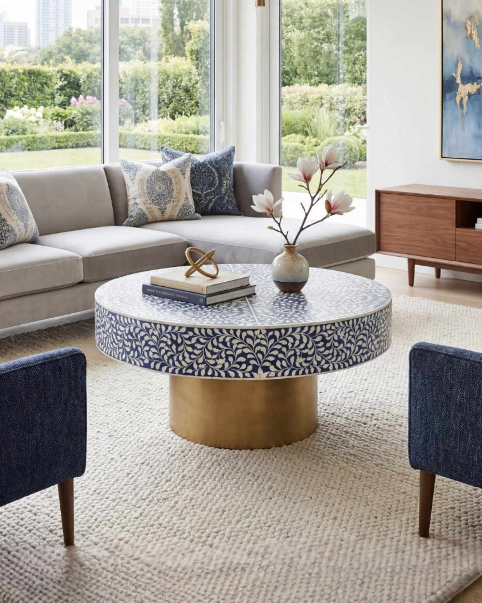 Bone inlay coffee table featuring intricate floral vine pattern in blue and white, handcrafted furniture piece.