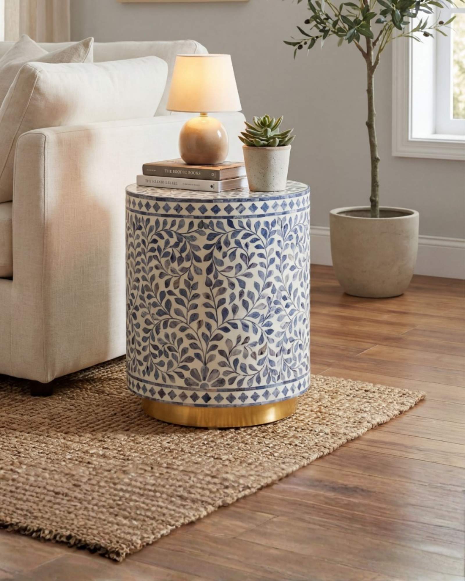 Handcrafted Jade side table featuring intricate blue bone inlay with a cylindrical silhouette and refined artisanal detailing.