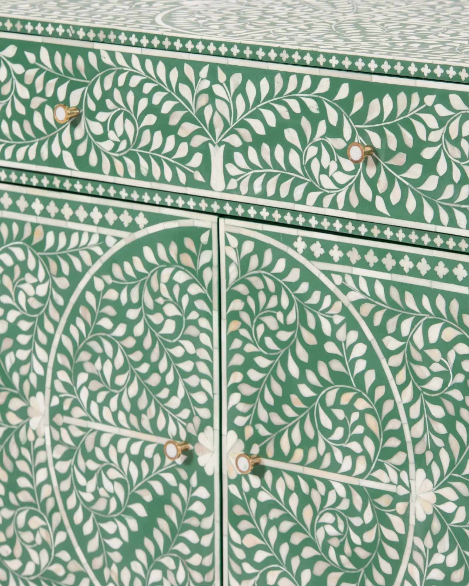 Featuring a beautiful floral sideboard in Green Bone Inlay with intricate hand inlaid work. Part of the Jade Collection - this buffet can be used as at an entryway or as a cutlery storage unit.