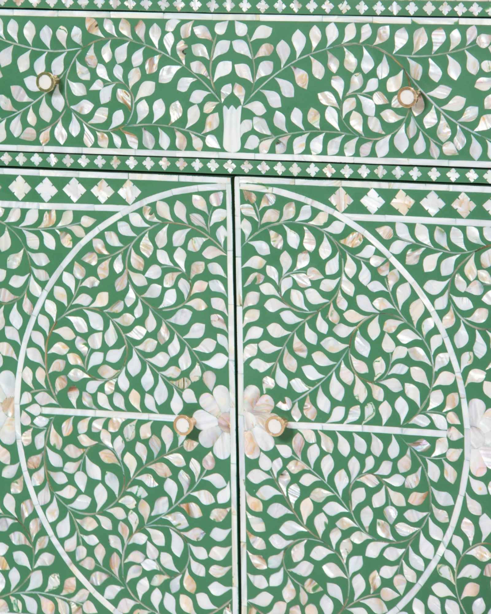 Featuring a beautiful floral sideboard in Green Mother of Pearl Inlay with intricate hand inlaid work. Part of the Iris Collection - this buffet can be used as at an entryway or as a cutlery storage unit.