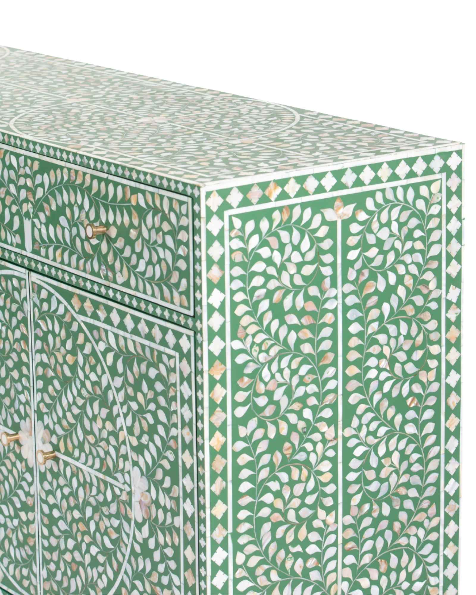 Featuring a beautiful floral sideboard in Green Mother of Pearl Inlay with intricate hand inlaid work. Part of the Iris Collection - this buffet can be used as at an entryway or as a cutlery storage unit.