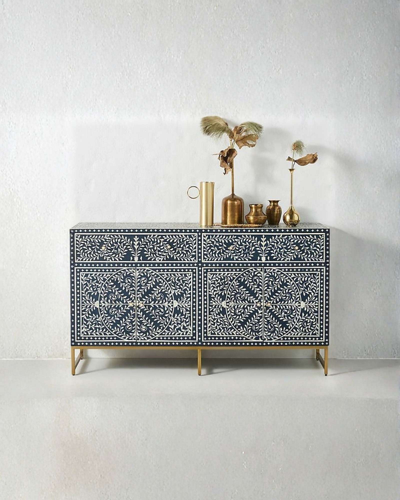 Handcrafted Navy Blue Bone Inlay Sideboard with intricate Bone Inlay, featuring floral pattern and sleek metal legs. A luxurious storage solution for any space.