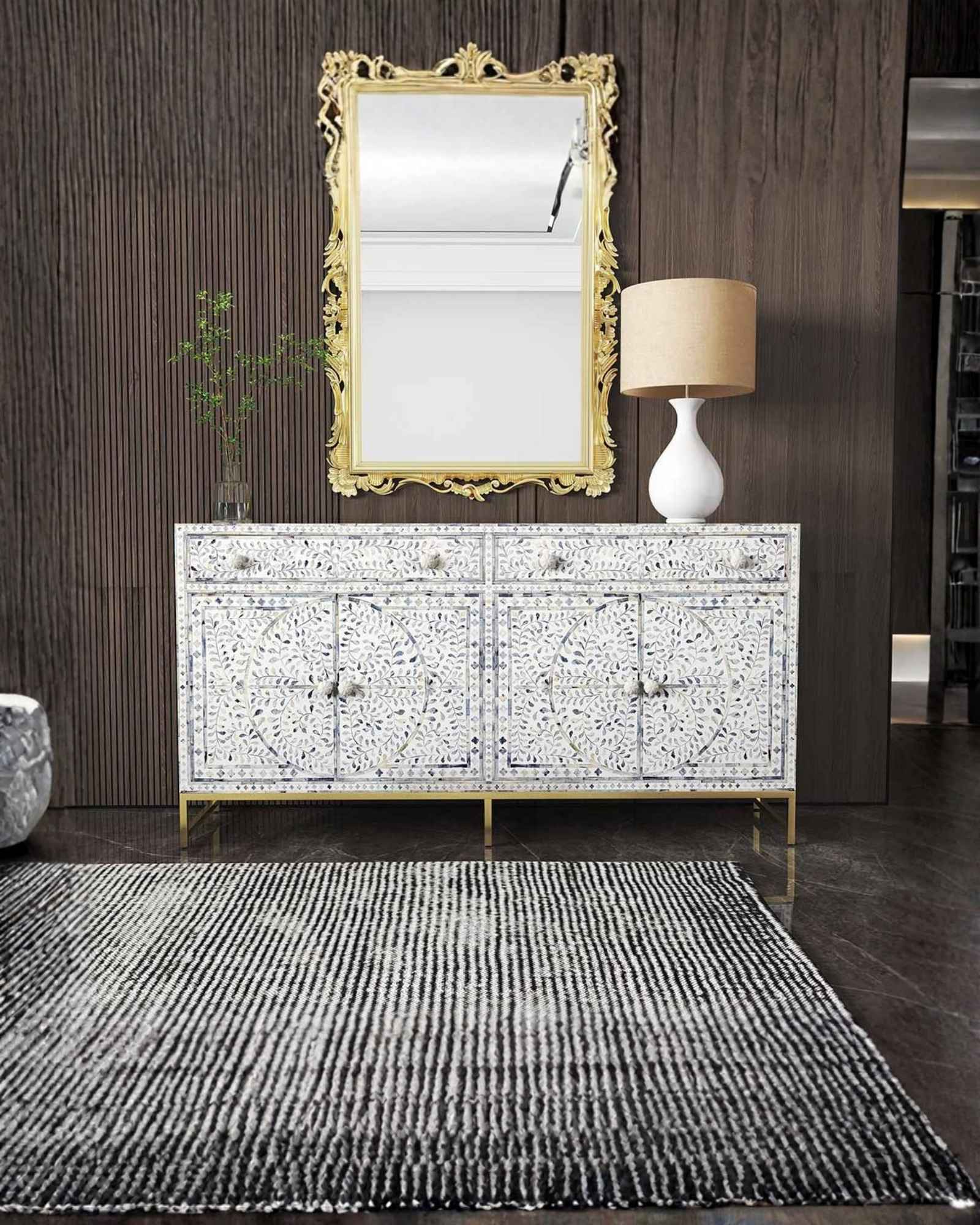 Featuring a beautiful floral sideboard in Dyed Blue Bone Inlay with intricate hand inlaid work. Part of the Jade Collection - this buffet can be used as at an entryway or as a cutlery storage unit.