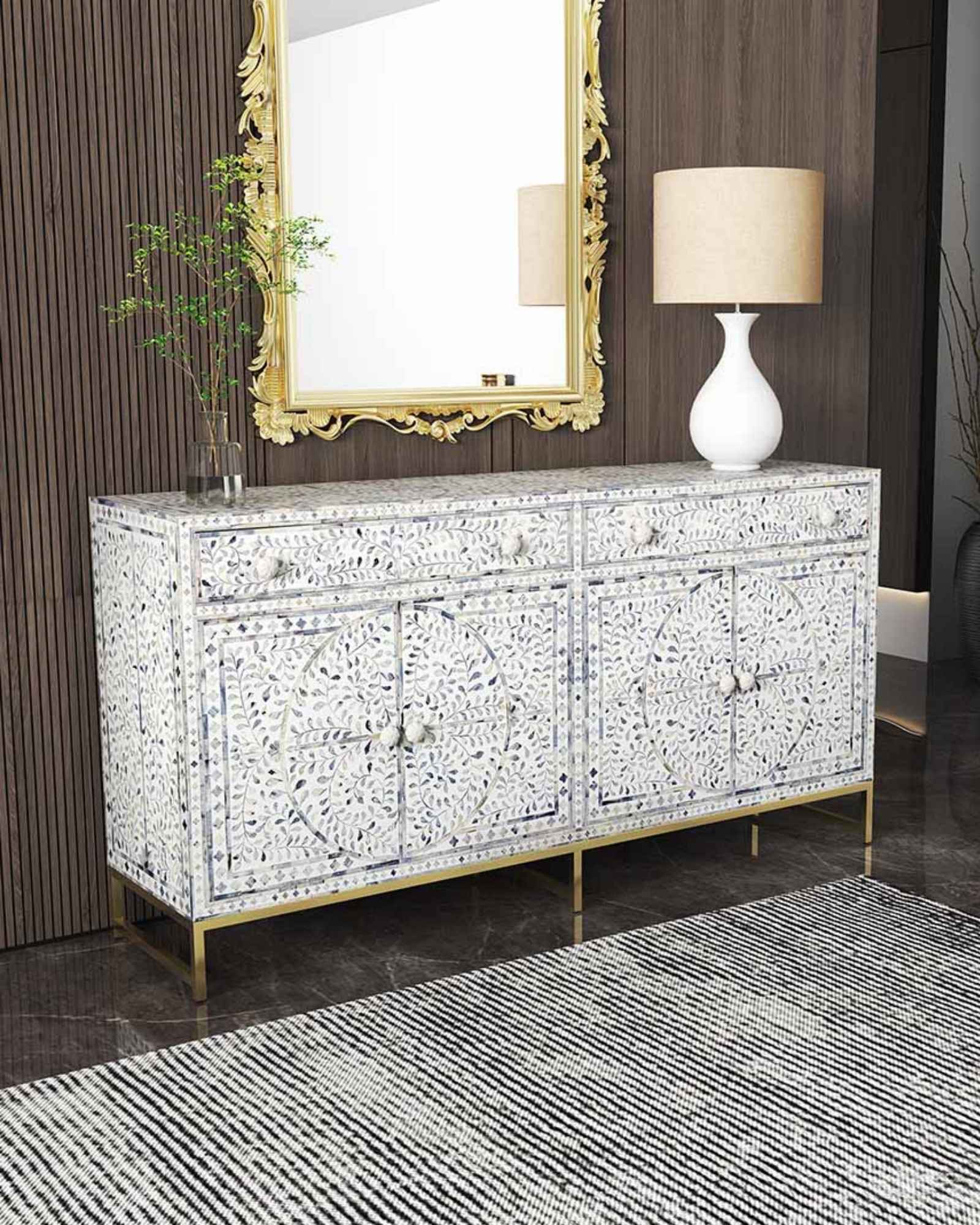 Featuring a beautiful floral sideboard in Dyed Blue Bone Inlay with intricate hand inlaid work. Part of the Jade Collection - this buffet can be used as at an entryway or as a cutlery storage unit.