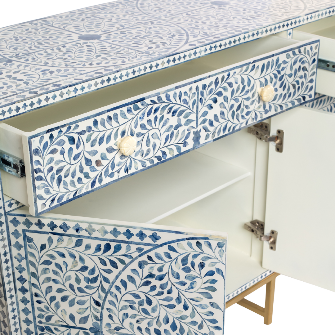 Featuring a beautiful floral sideboard in Dyed Blue Bone Inlay with intricate hand inlaid work. Part of the Jade Collection - this buffet can be used as at an entryway or as a cutlery storage unit.