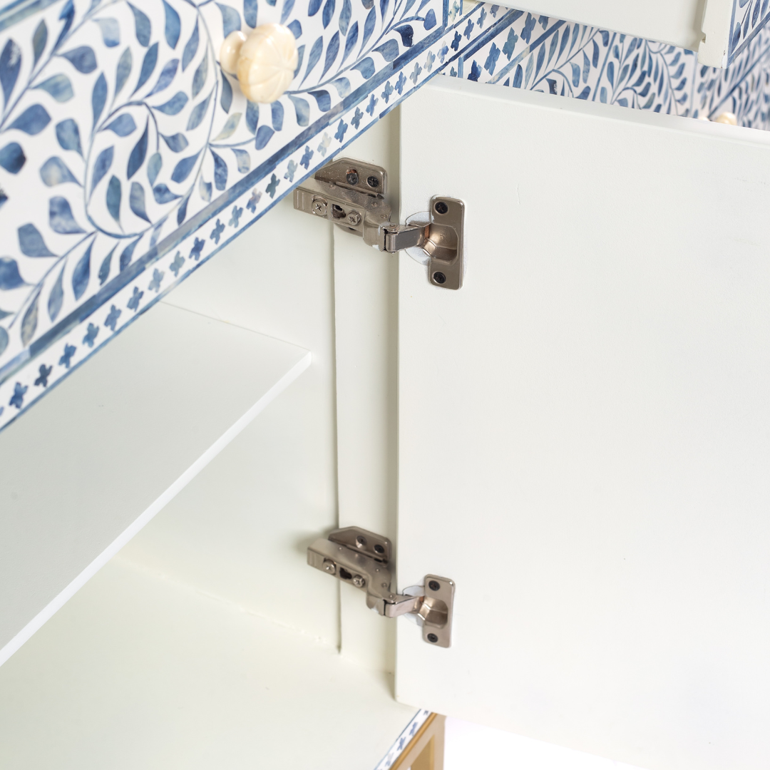 Featuring a beautiful floral sideboard in Dyed Blue Bone Inlay with intricate hand inlaid work. Part of the Jade Collection - this buffet can be used as at an entryway or as a cutlery storage unit.