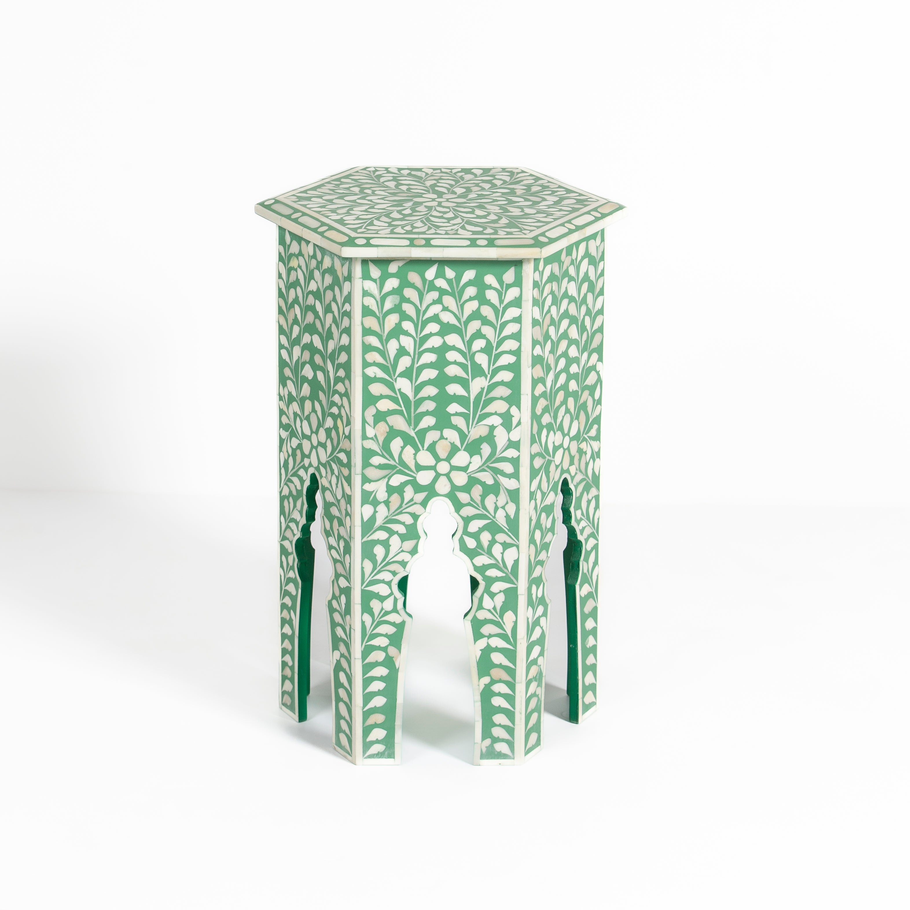 Handcrafted Jade side table featuring green bone inlay with a hexagonal silhouette, floral detailing, and arched legs.