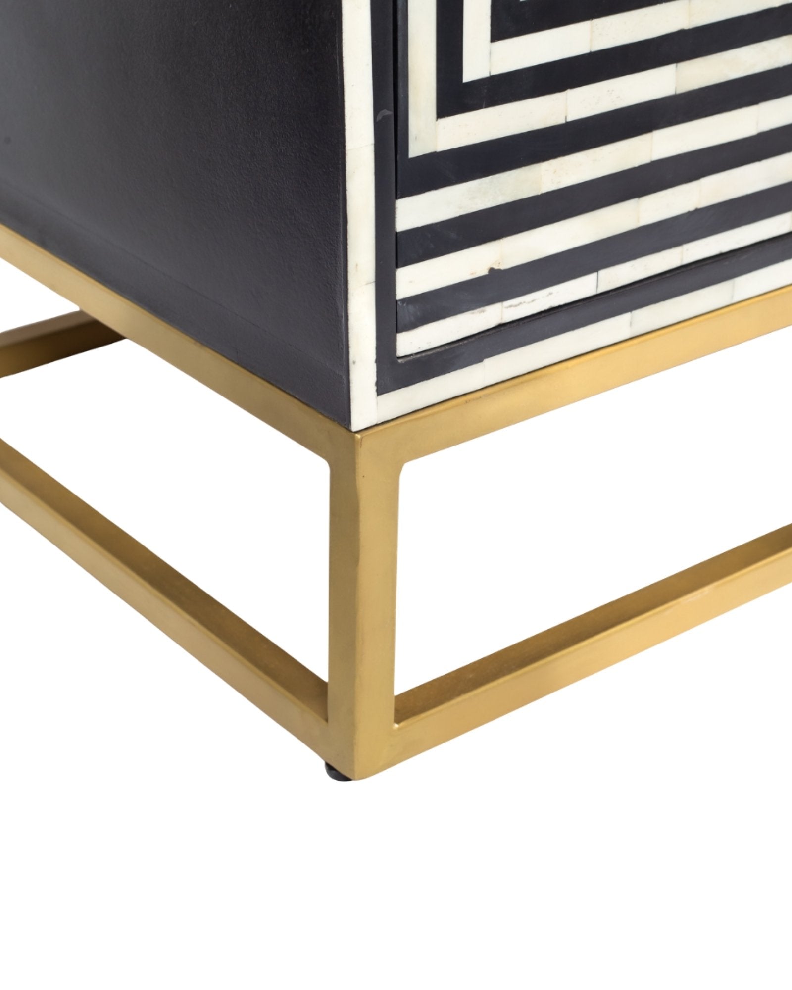Black & White bone inlay cabinet in striped vine pattern, brass legs, and brass handles, handcrafted with spacious storage and artisanal charm.