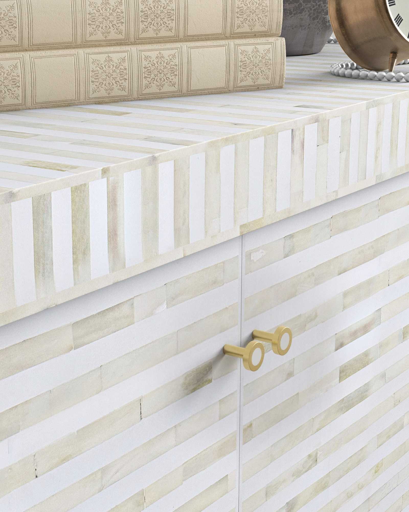 Elegant white bone inlay Lipari Cabinet with gold accents, handcrafted with intricate detailing and ample storage.