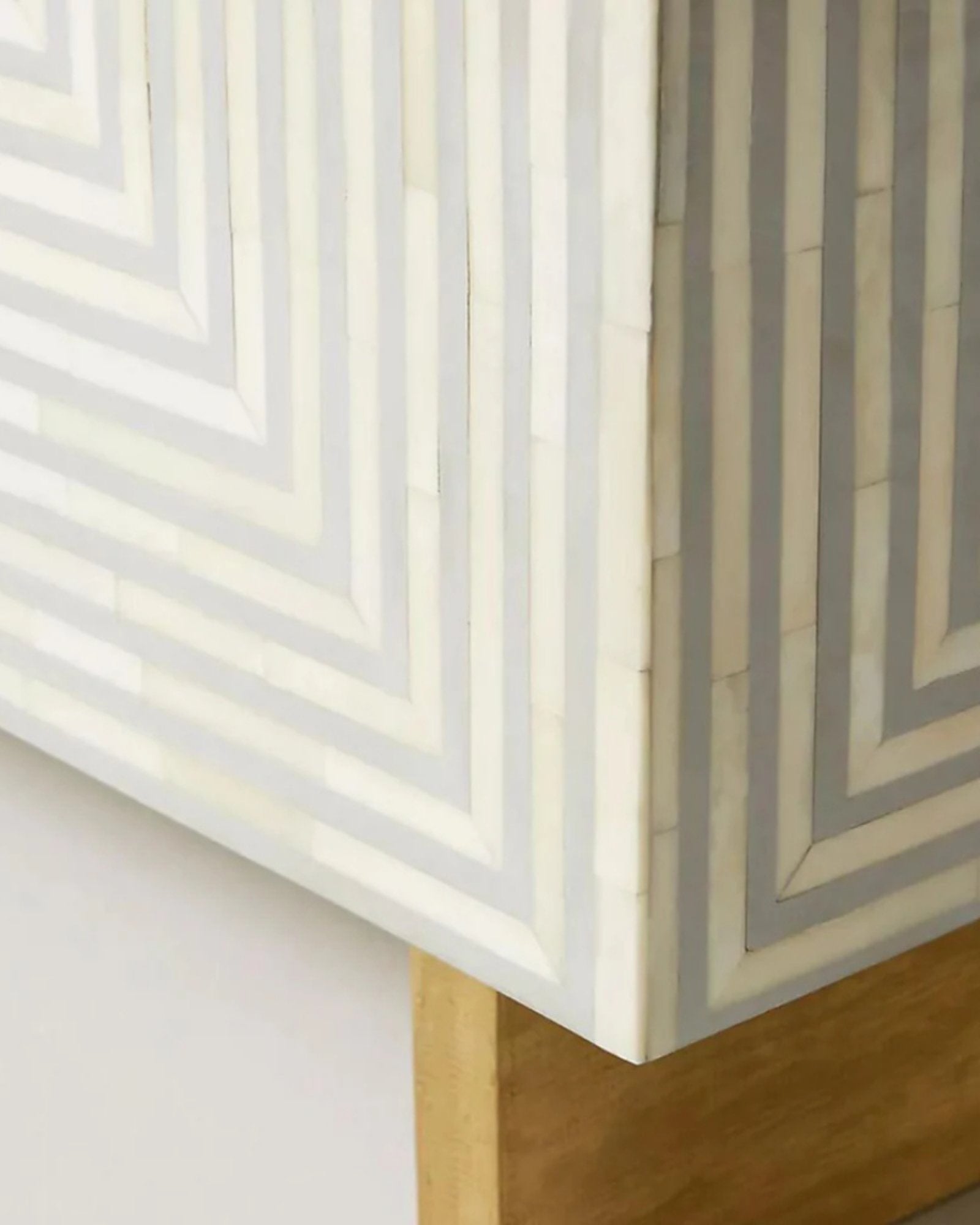 Rectangular grey striped bone inlay coffee table with a sleek design.