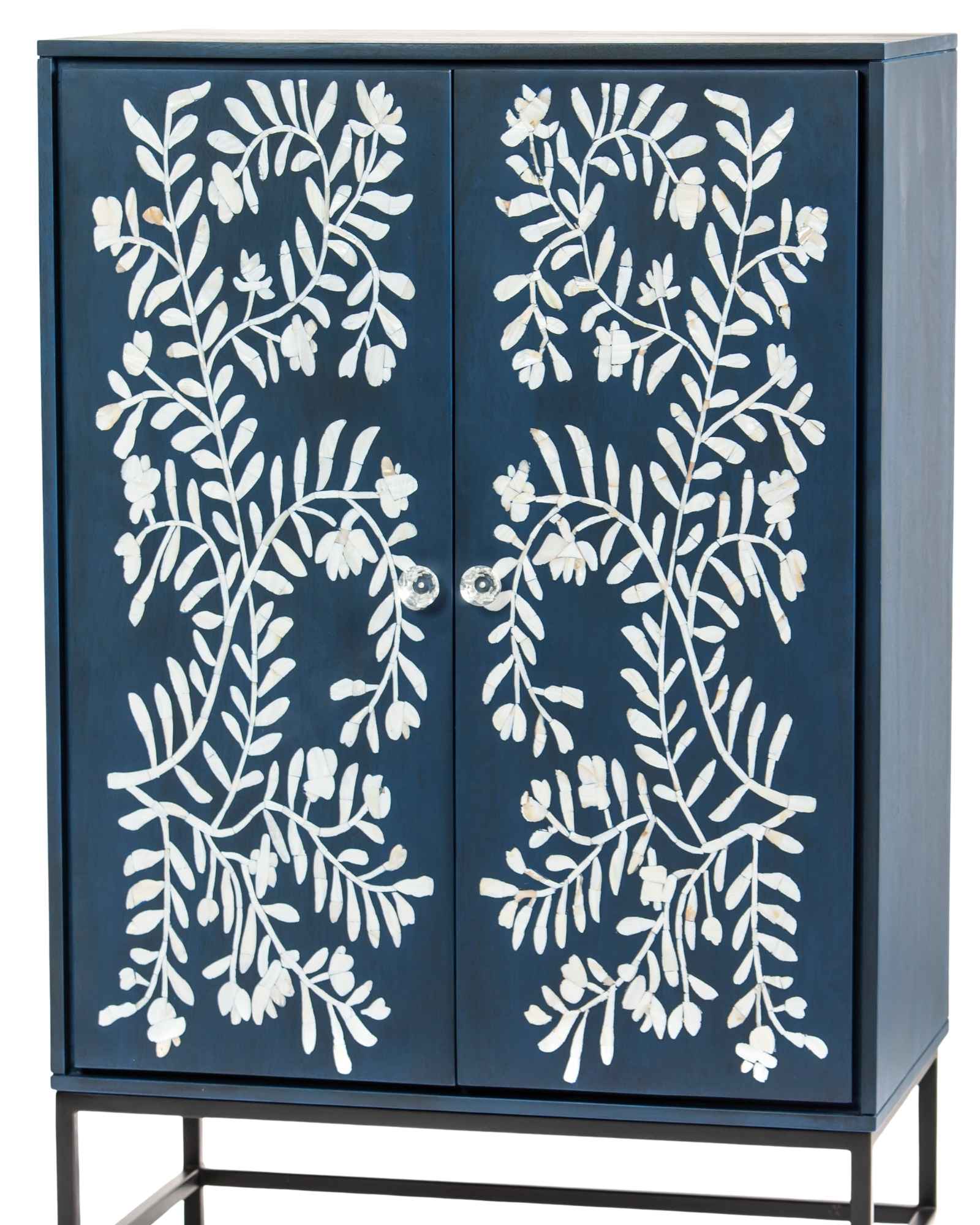 Mother of pearl inlay cabinet featuring intricate floral vine pattern in blue and white, handcrafted furniture piece.